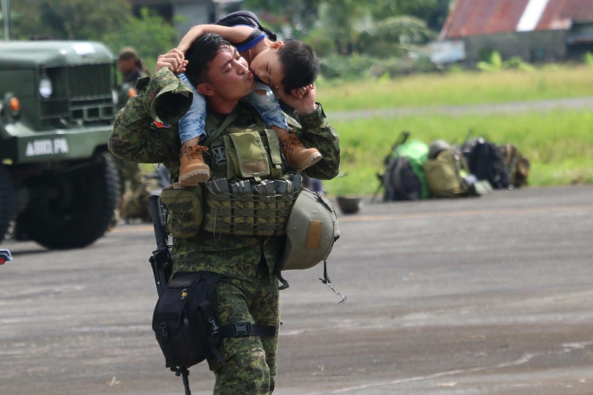 An soldier from Philippines returning home to his family. r/pics