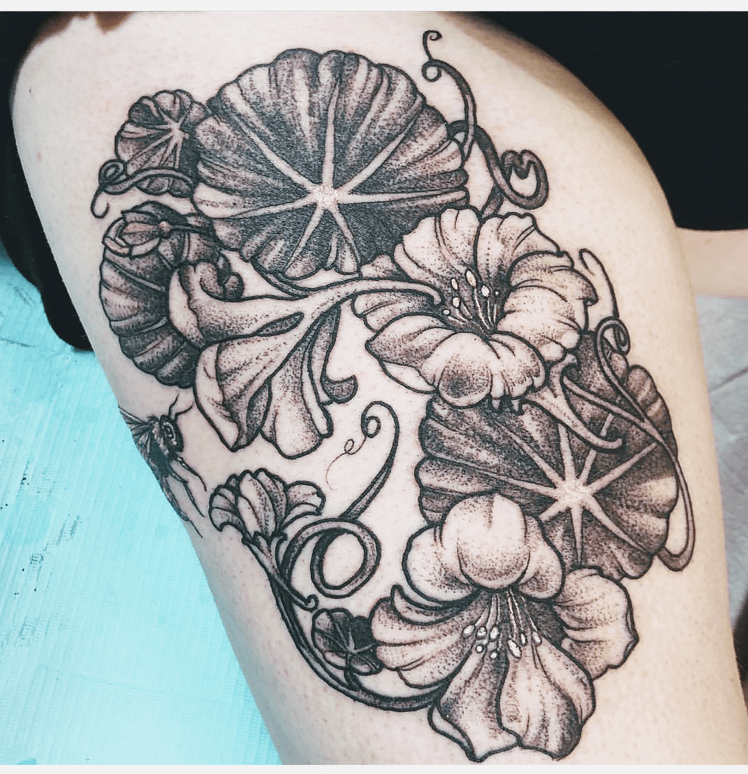 Nasturtium flowers and a bee by Elle Burnham at Seven Horses Tattoo in