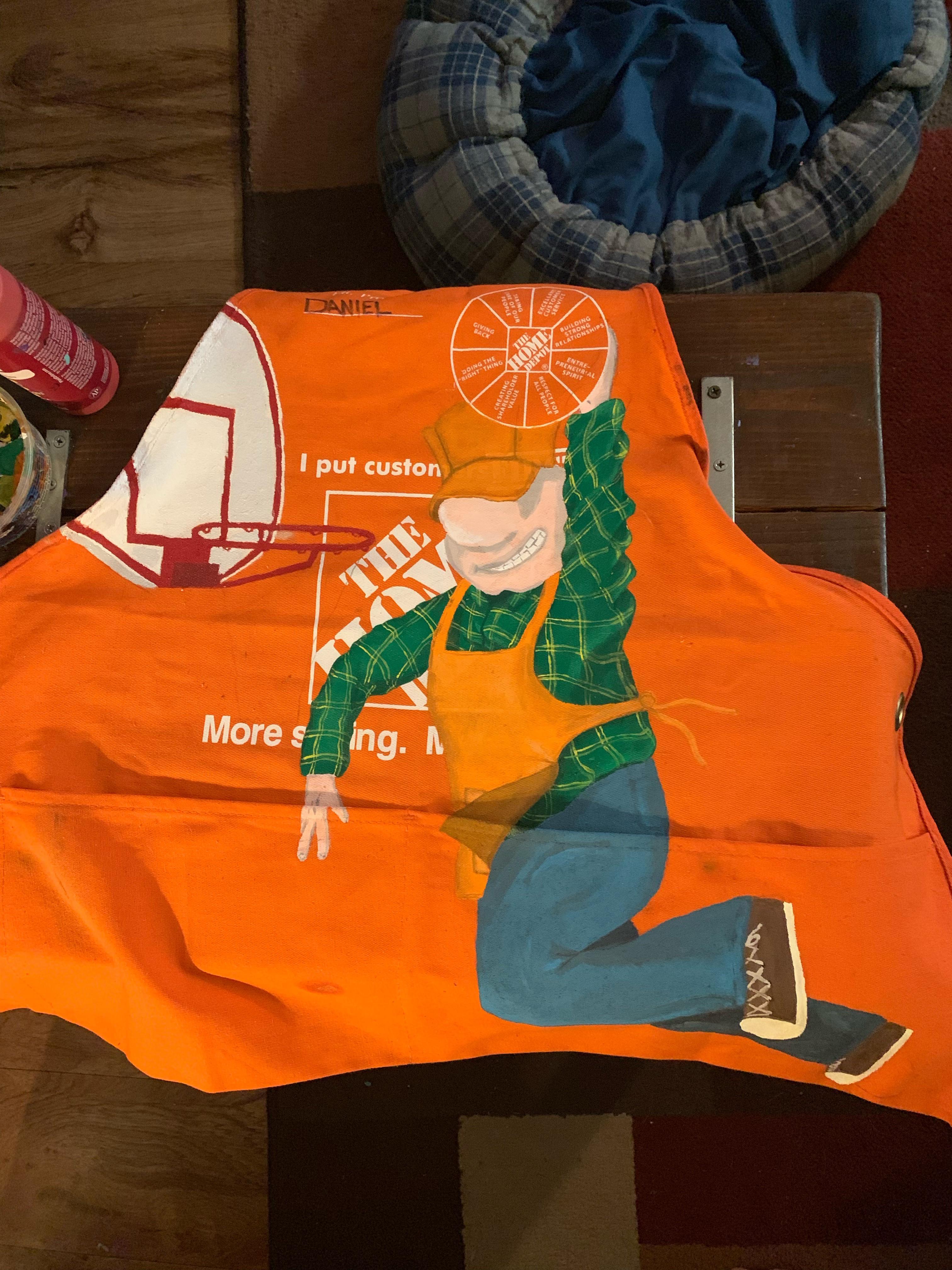 I painted this apron for my cousin who works at Home Depot r/HomeDepot