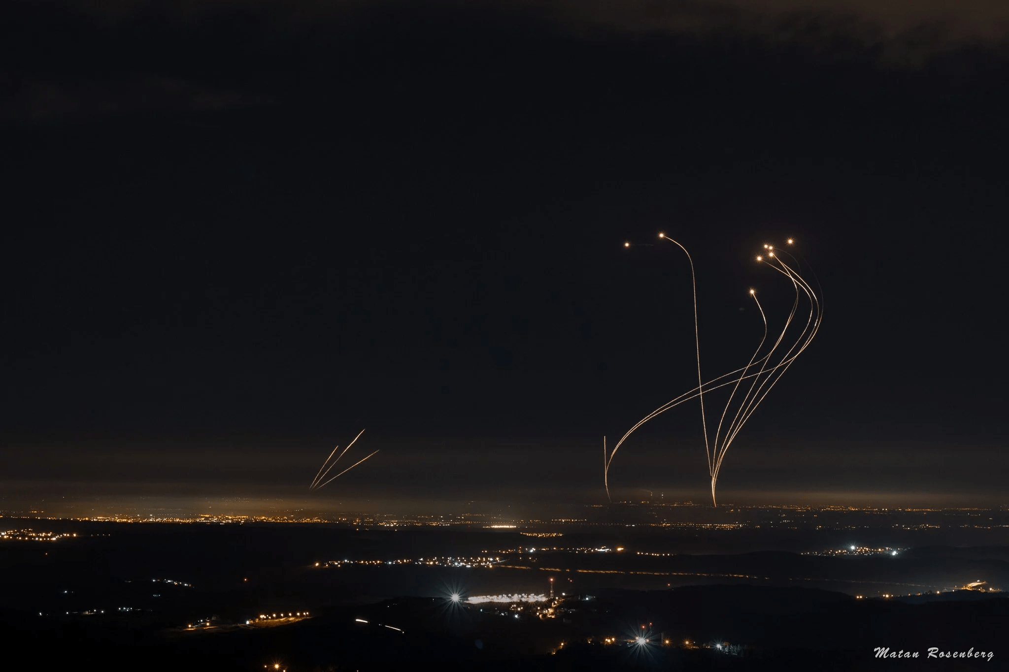 Israel Iron Dome intercepting Hamas' unguided rocket attack at night
