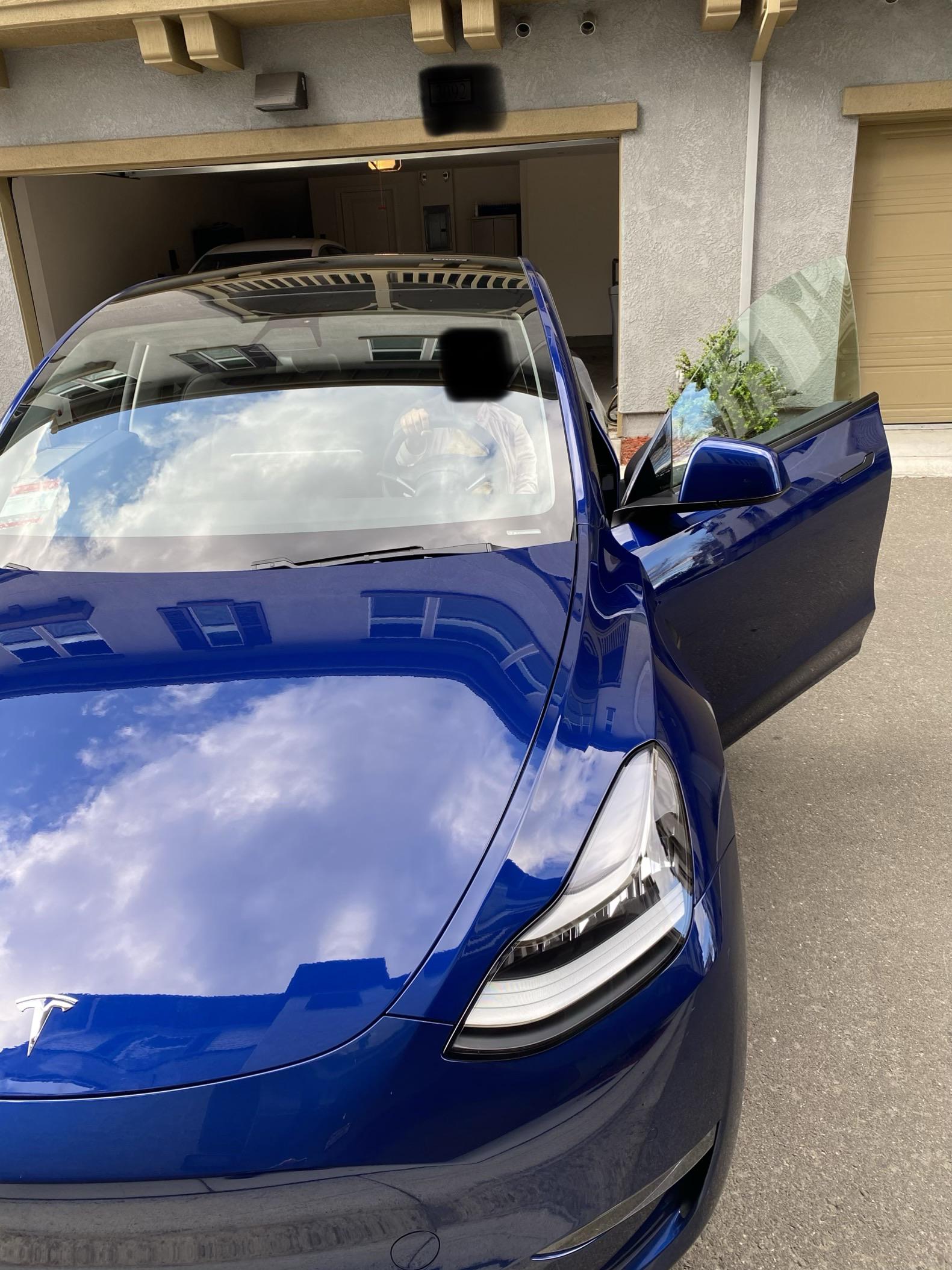 Got my Tesla Y delivered. 20 inch induction wheels. Full self driving
