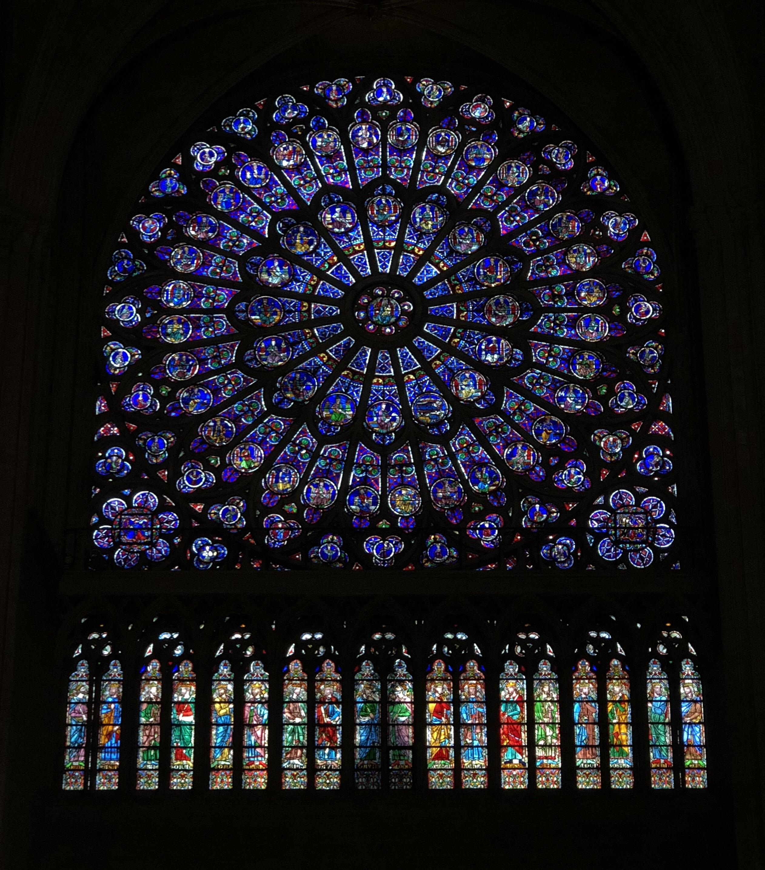 Stained glass window in the Notre Dame Cathedral, Paris. r/pics
