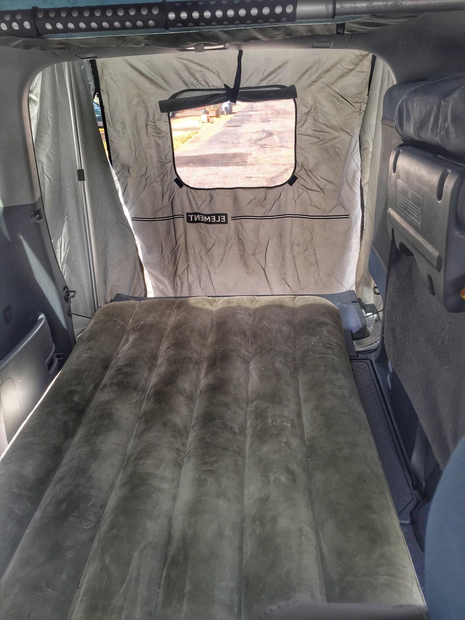A view from inside, single wide air mattress. Element tent looking for