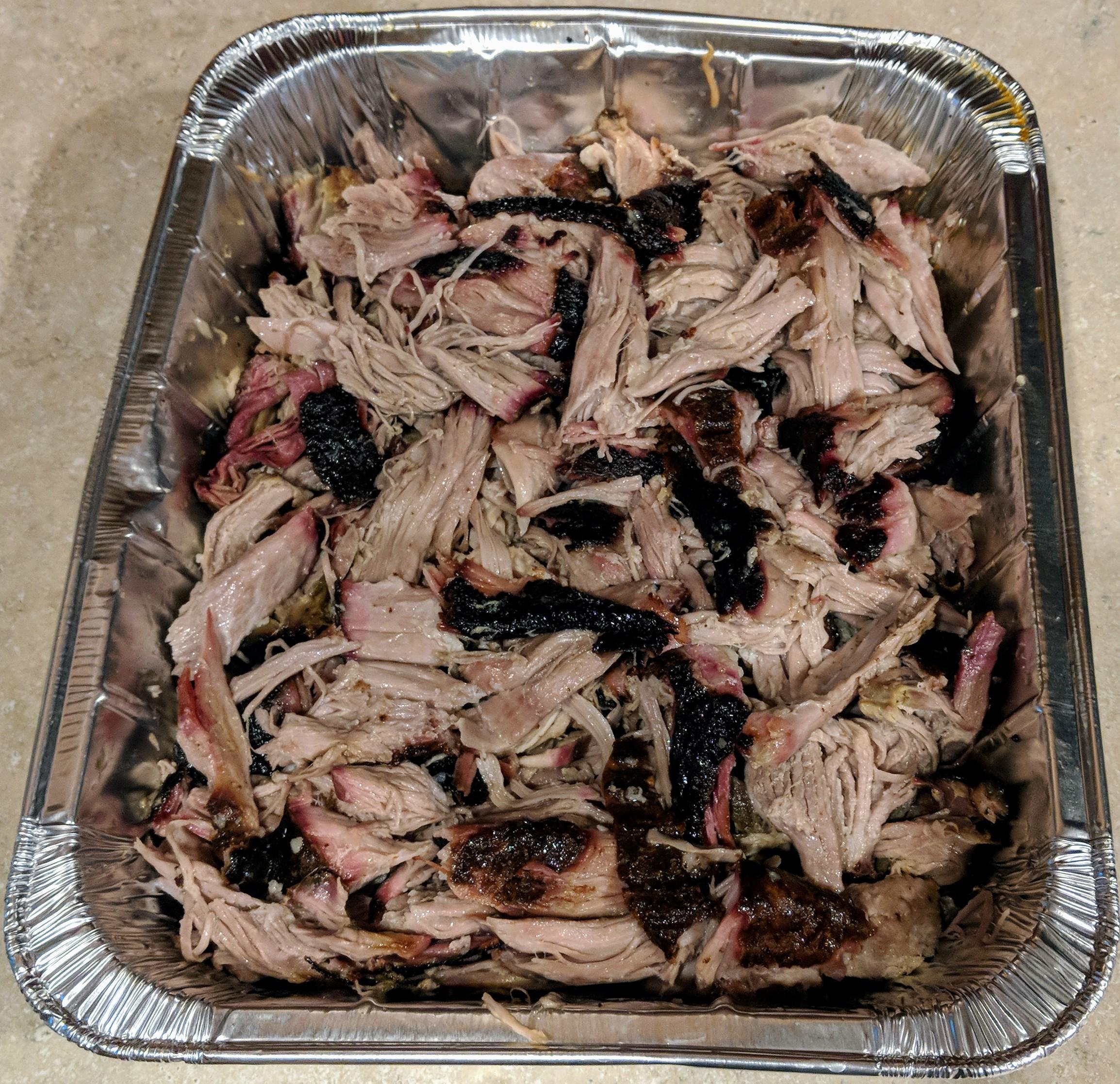 14 hour pulled pork on the WSM. 225, oak, foil pan at 180 with apple