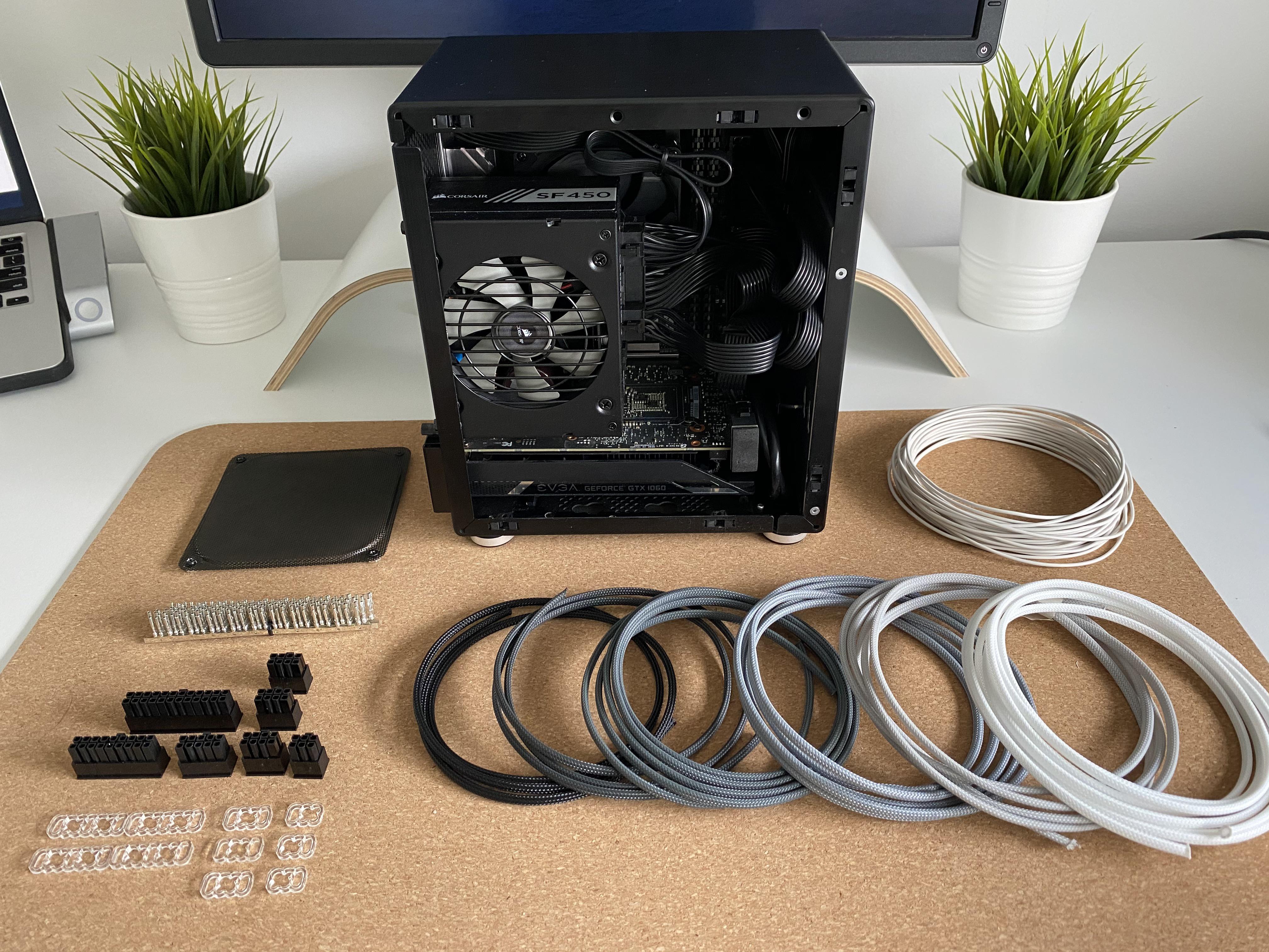 My first sffpc build. Time to clean up the jungle. Lian Li PCQ21