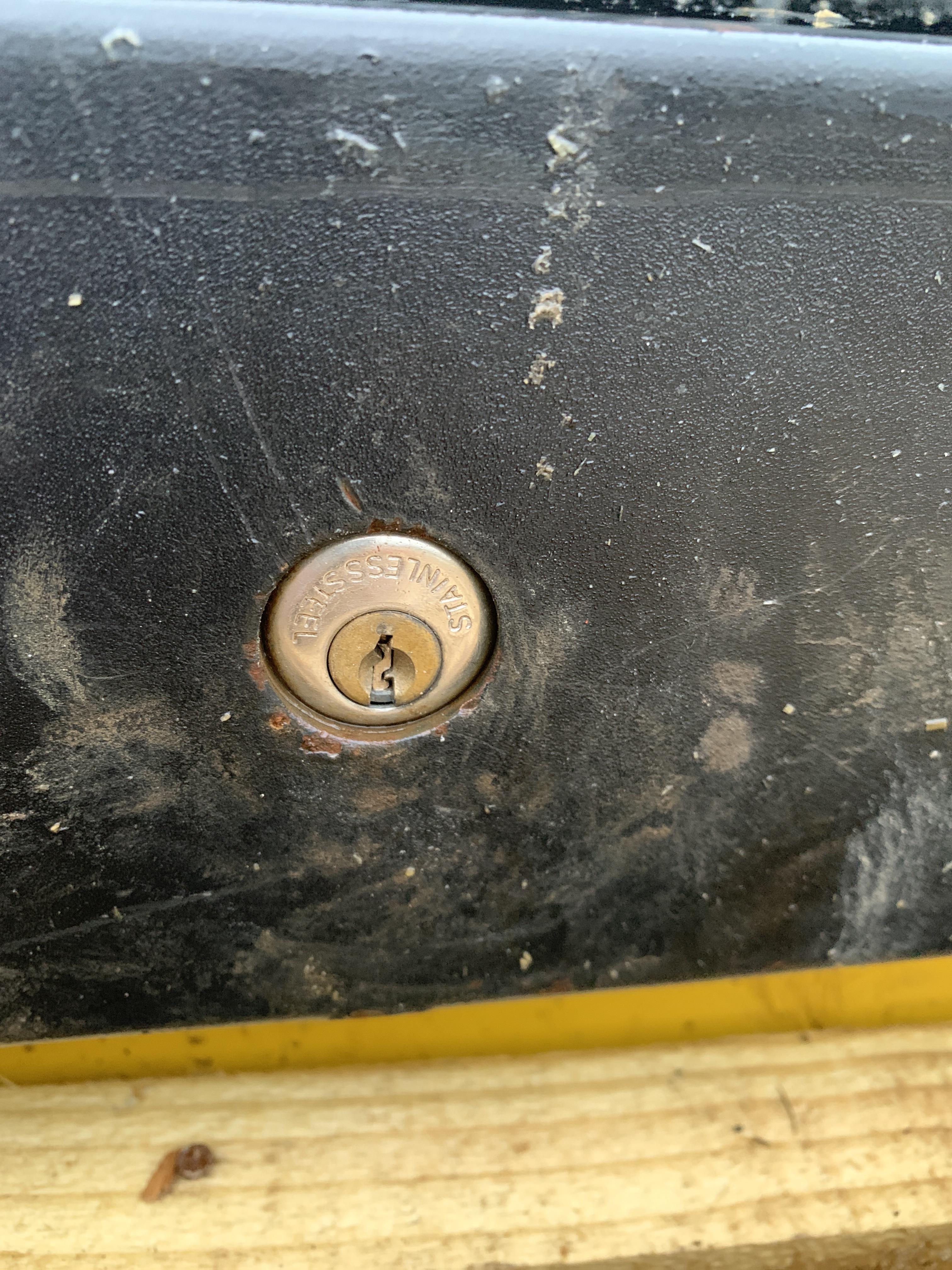 Advice on how to get padlock with key snapped inside of it out of tool