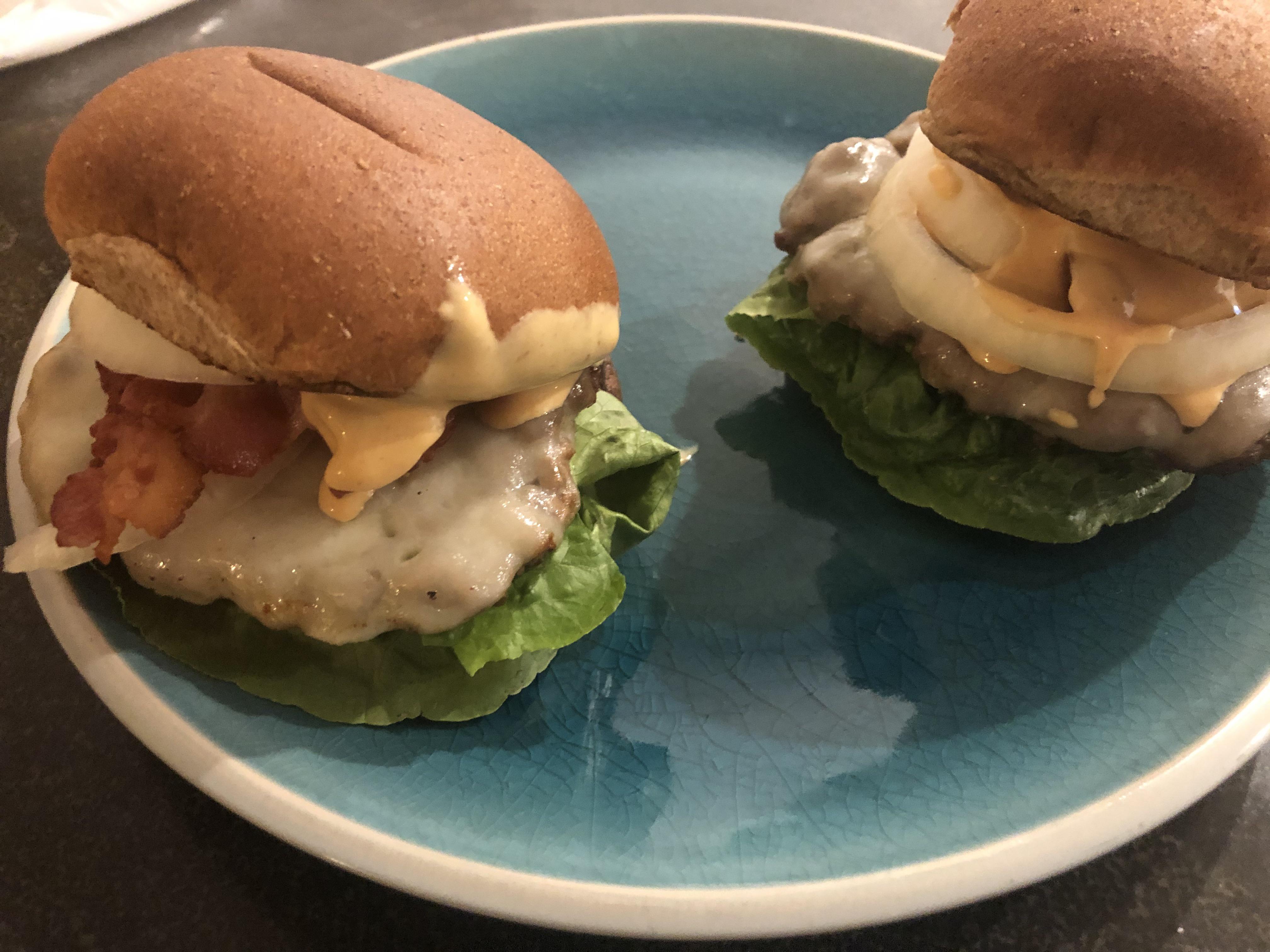Couple of bacon cheese burgers with provolone, special sauce, and romance lettuce r/burgers