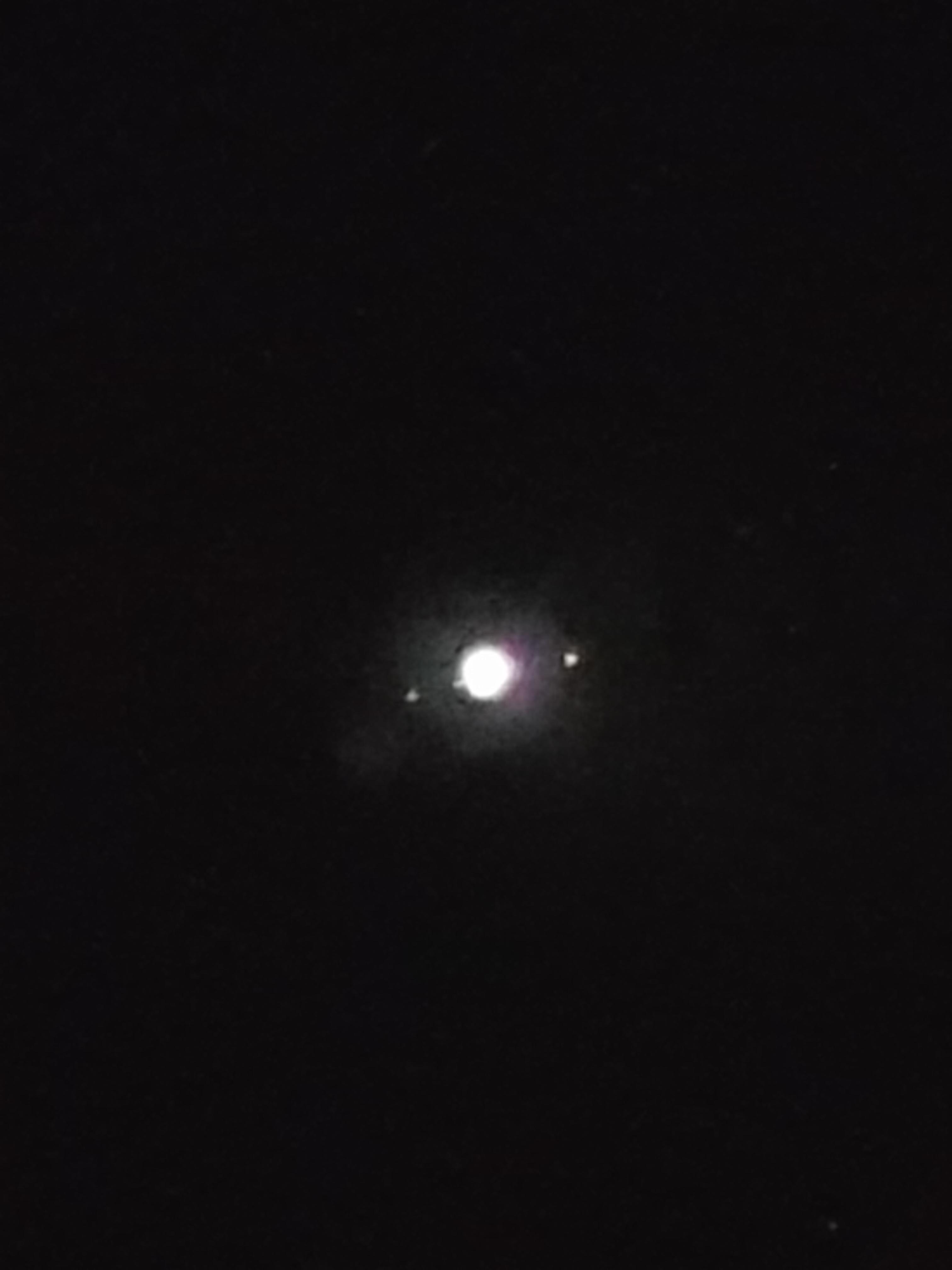 Jupiter, as seen on my s8, through binoculars. Ya, it ain't much to