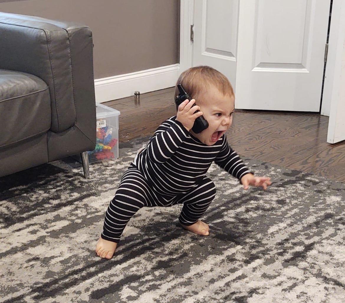 PsBattle Baby screaming into a phone