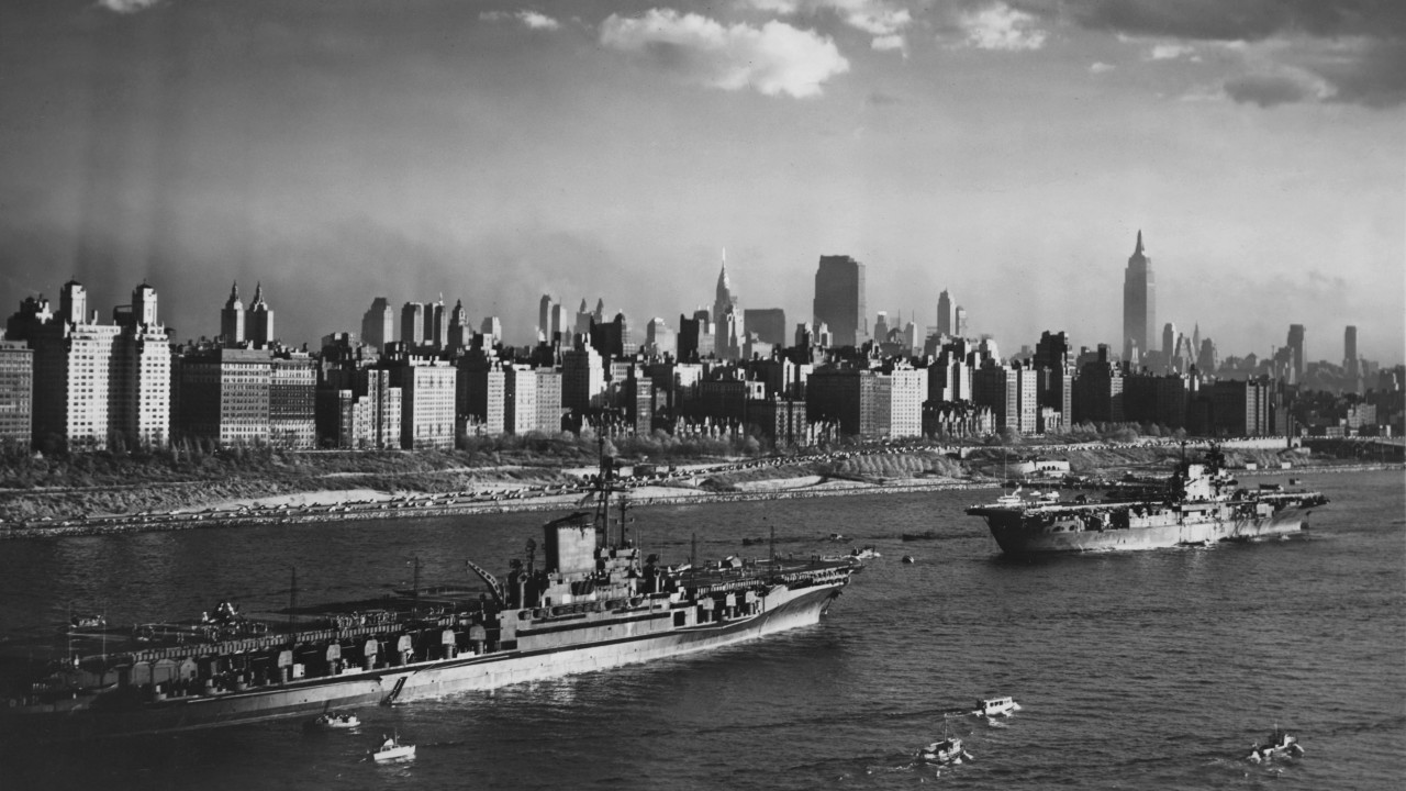 Enterprise and Midway sailing into Manhattan for Navy Day on 27 October
