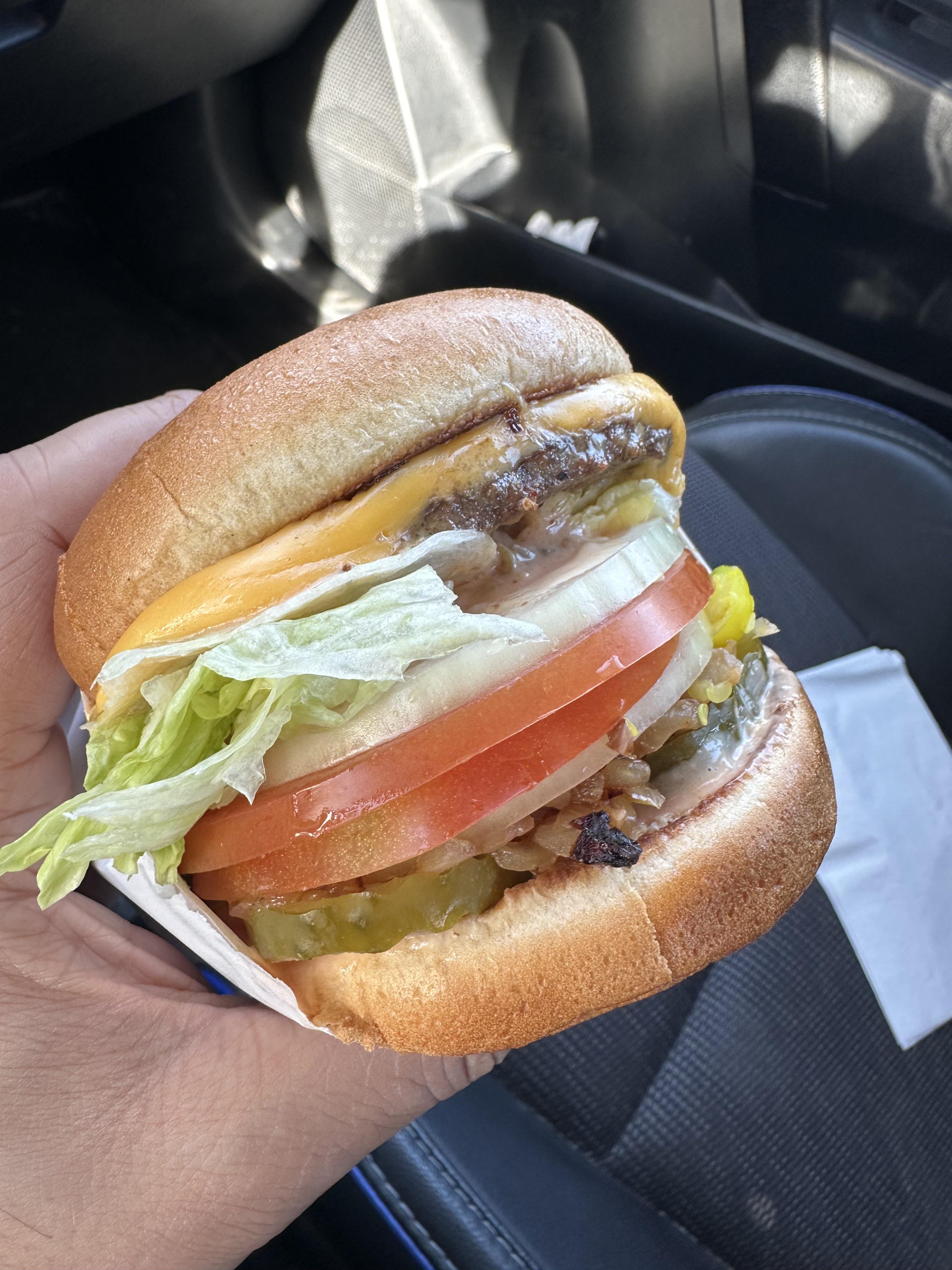 Cheeseburger, animal style, extra grilled onions, extra raw onions, add