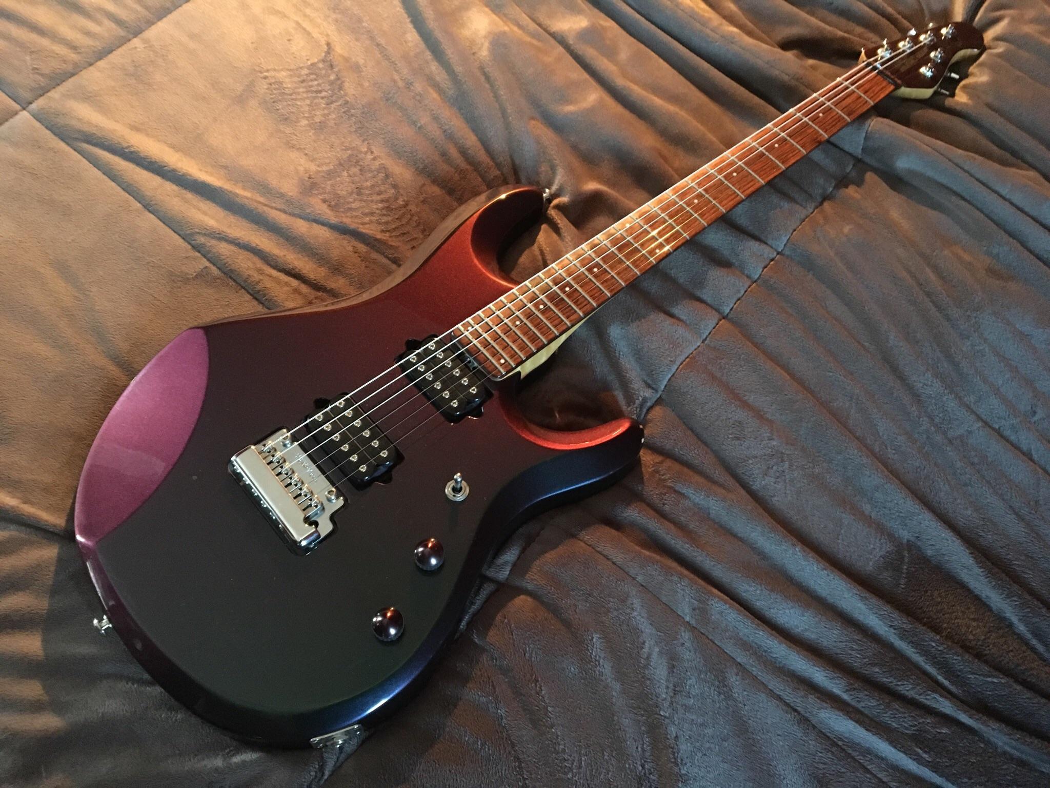 A bare bones 2001 Ernie Ball MusicMan JP6 in Mystic Dream. Amazing to