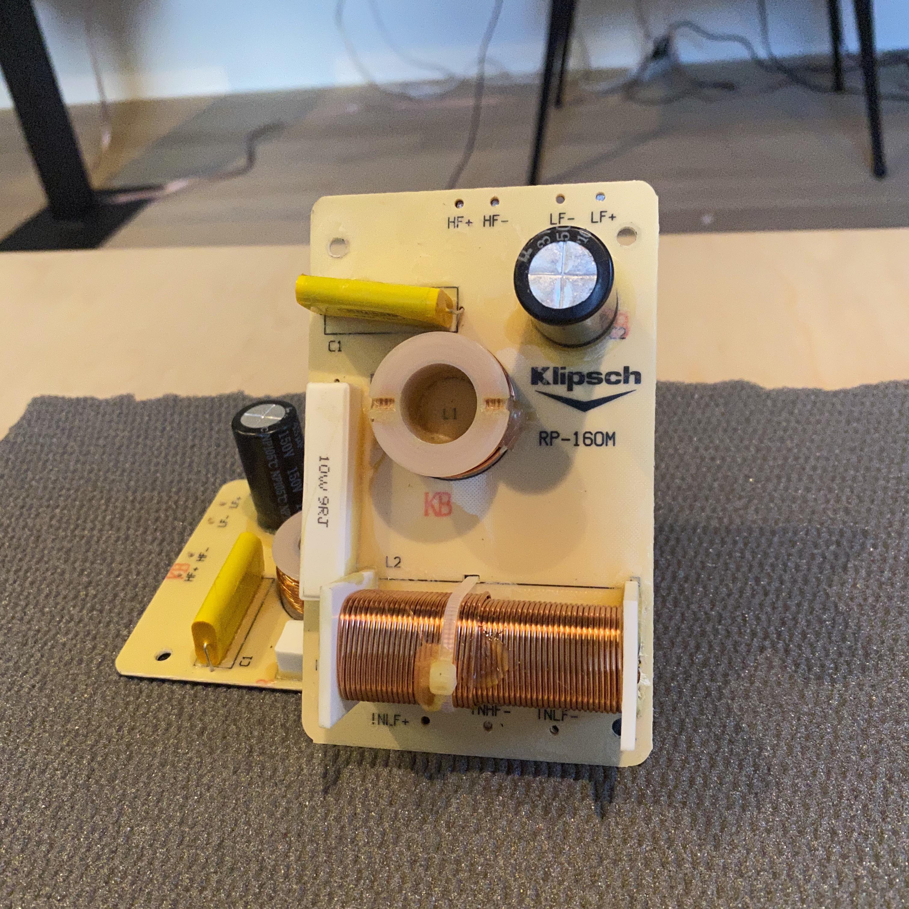 Here is the stock crossover from my Klipsch RP600M ( It looks like