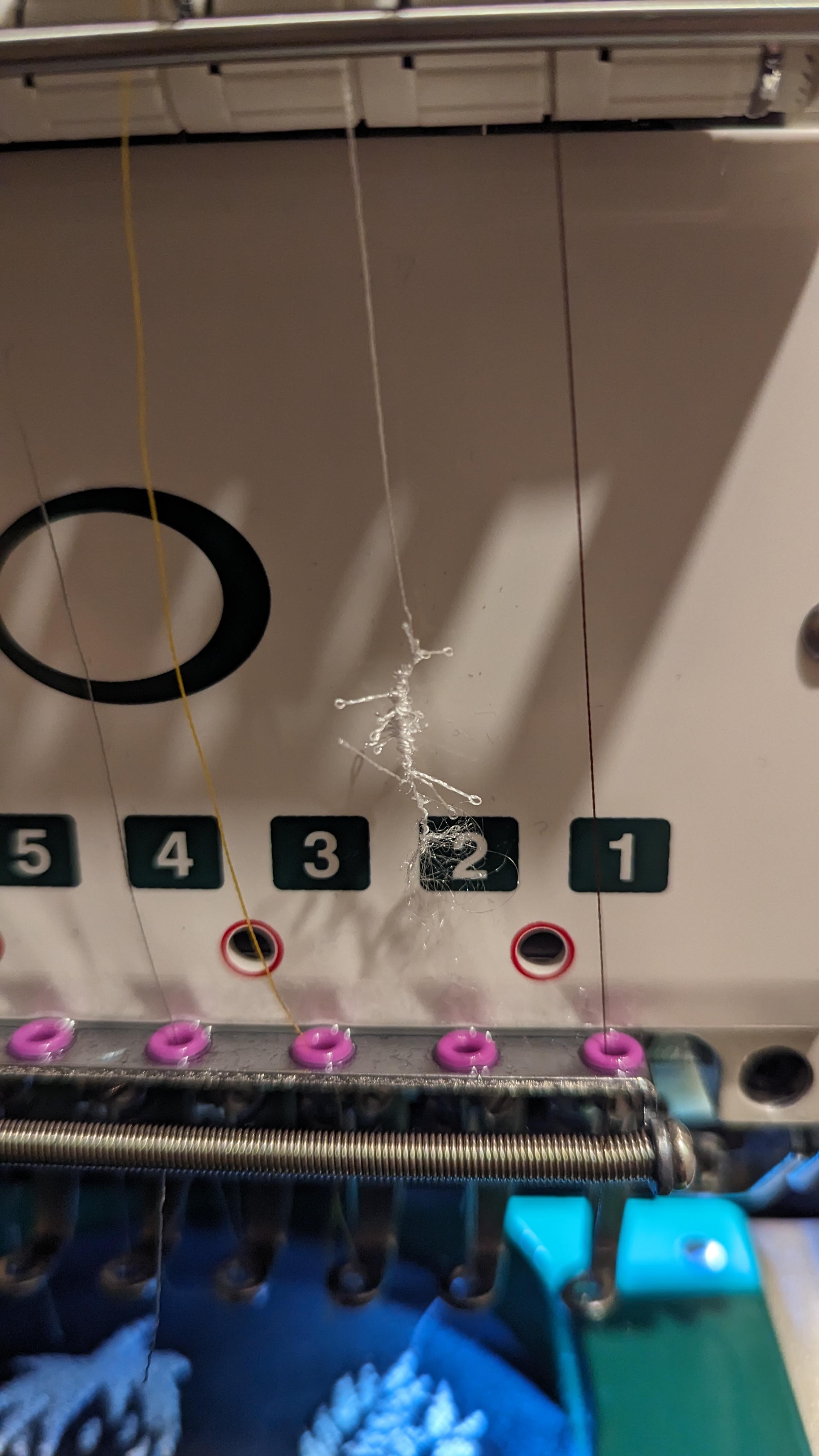 What causes this sort of fraying or clumping on the thread? Poor quality thread? r/Embroidery
