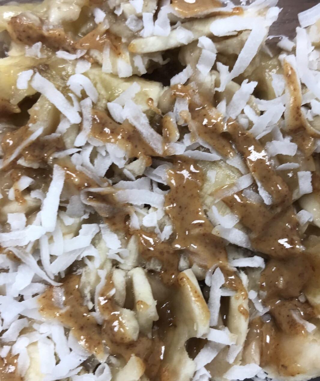 Breakfast on my very first day of Whole30... a mashed banana with unsweetened coconut flakes and