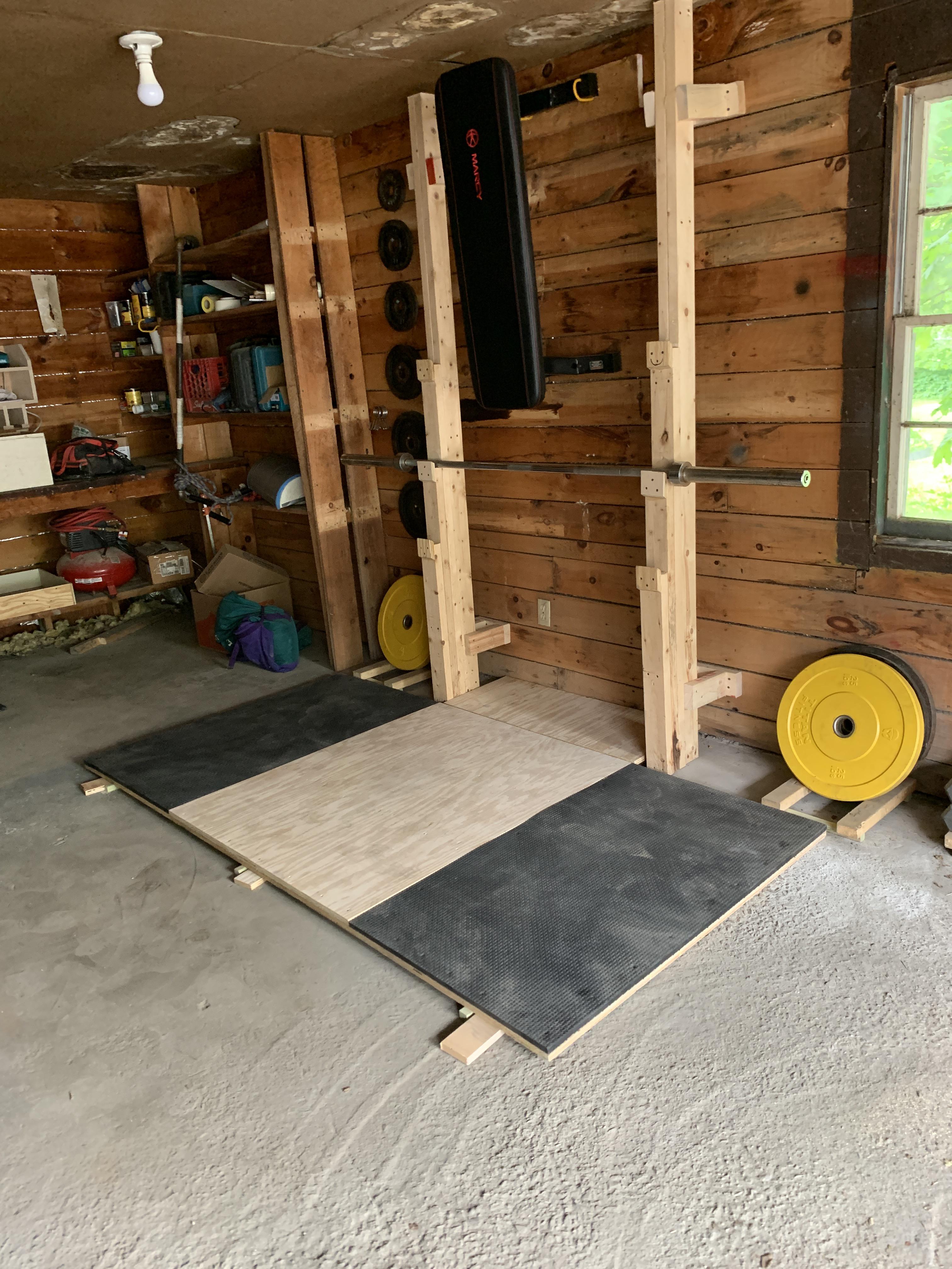 My humble compact garage gym. Just ordered powerblocks 570 thanks to