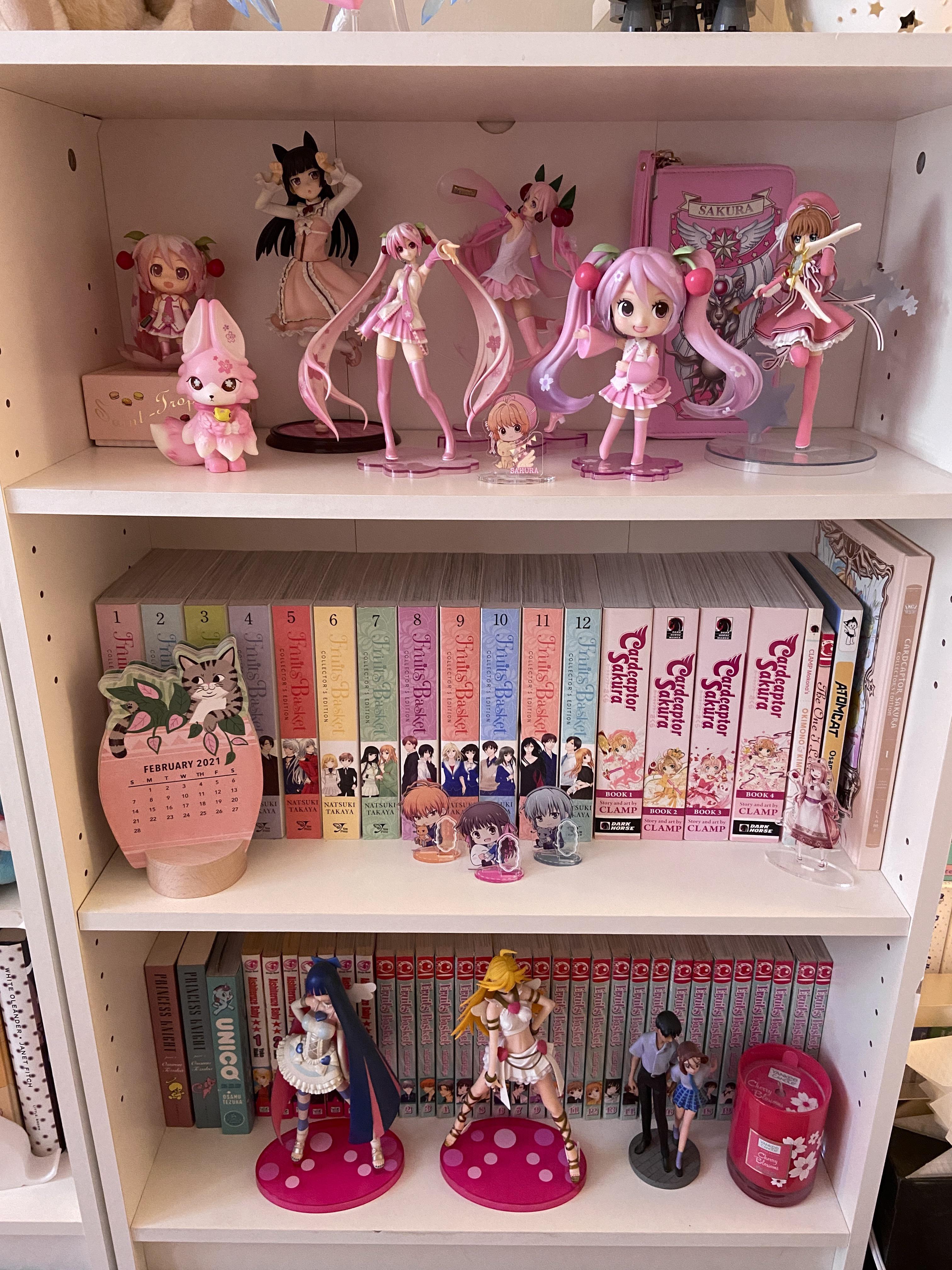 Organized a bunch of my pink and sakurathemed figures on this little