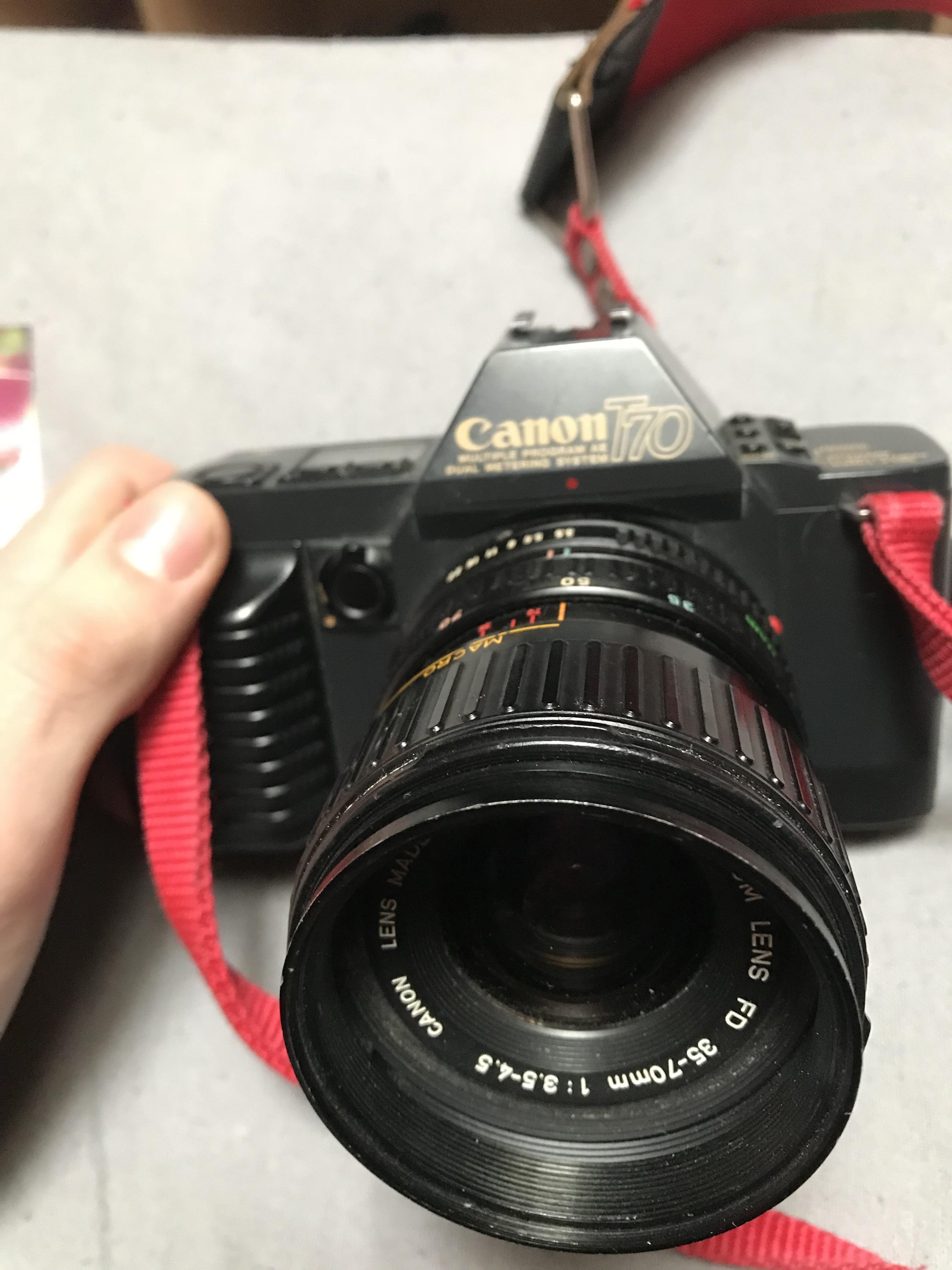 I found a Canon T70 with a canon zoom lens FD 3570mm upstairs where I