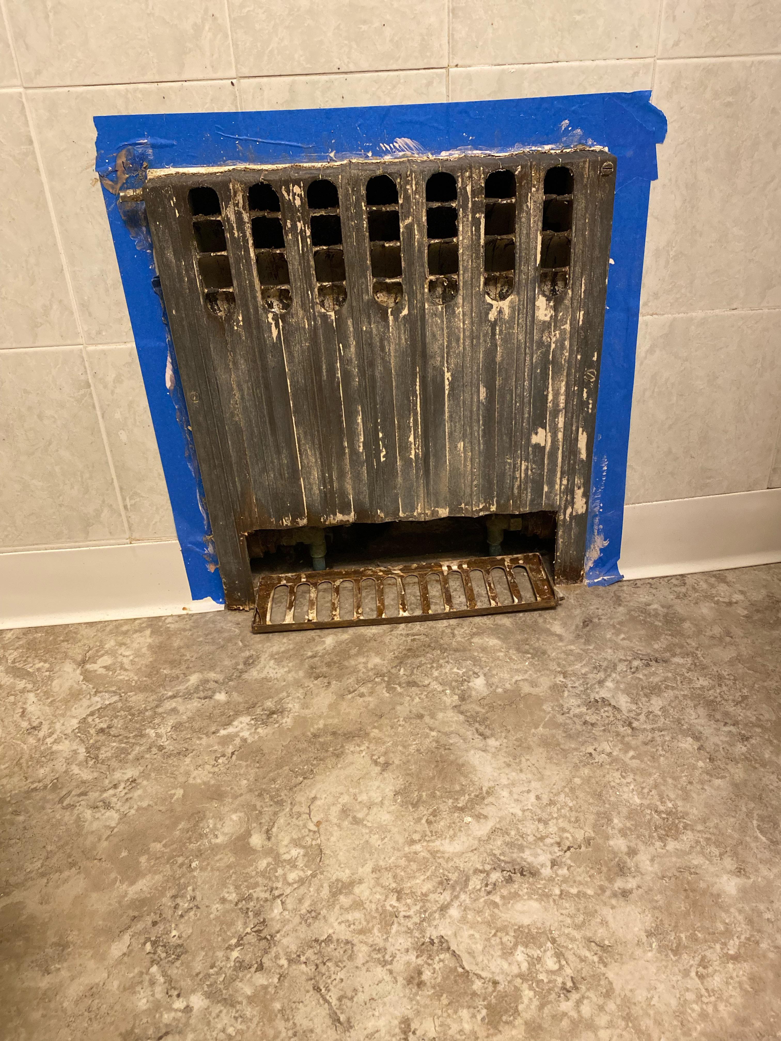 Slowly but surely stripping 6 layers of paint from cast iron radiator