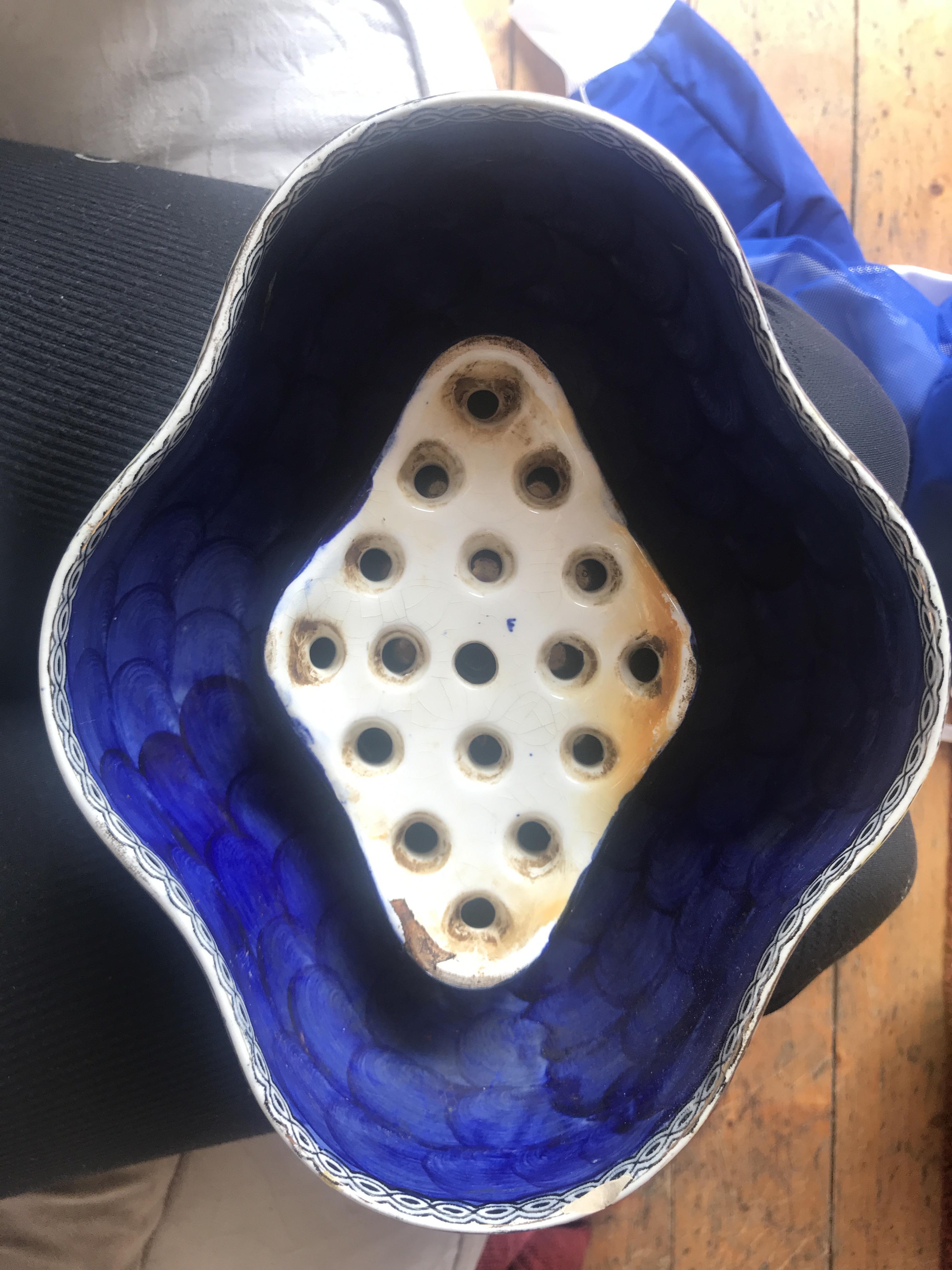 Found this pottery bowl. The white holed insert lifts out. r