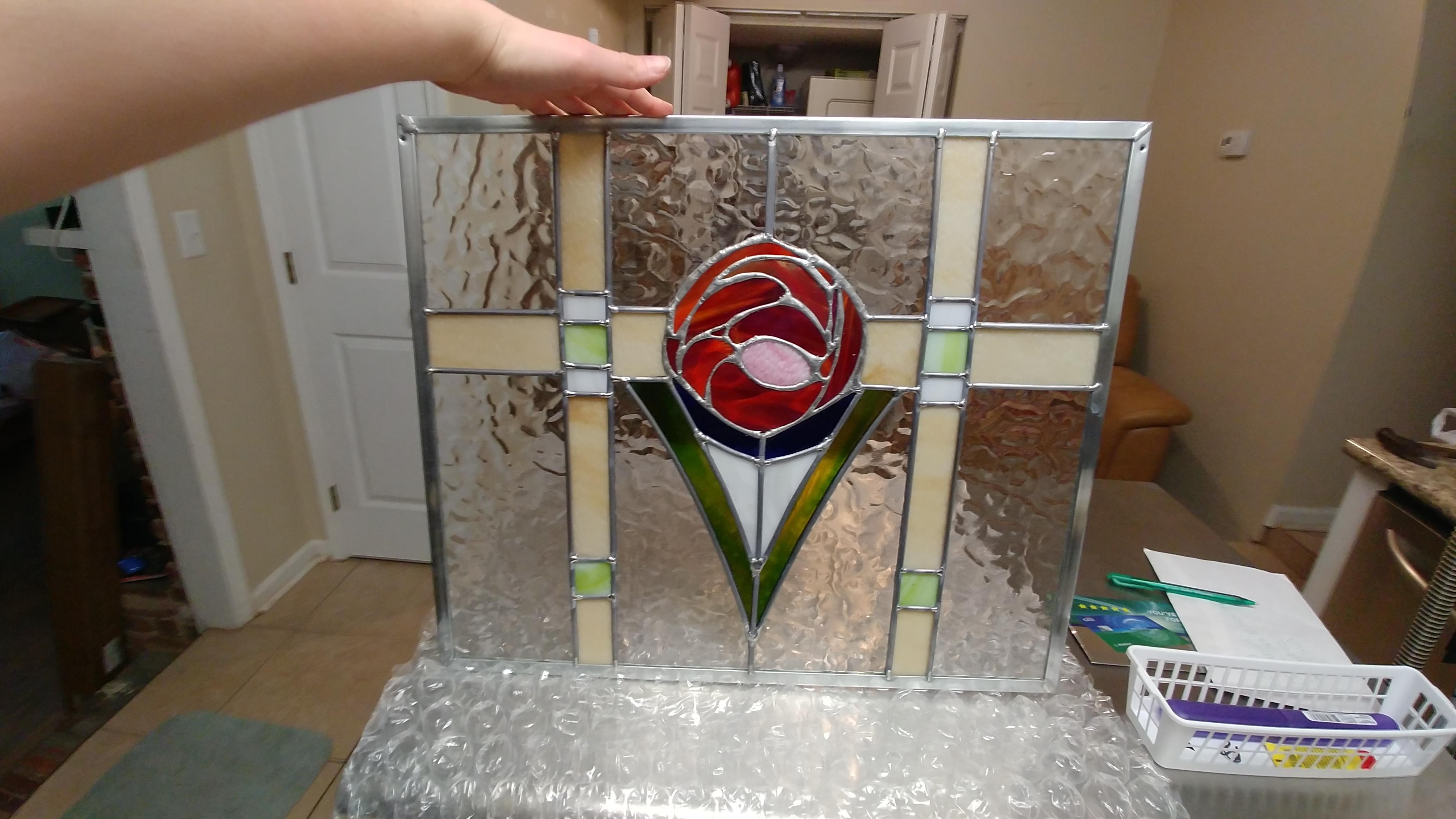 My first stained glass piece is finally finished! It's not perfect, but I am really pleased with