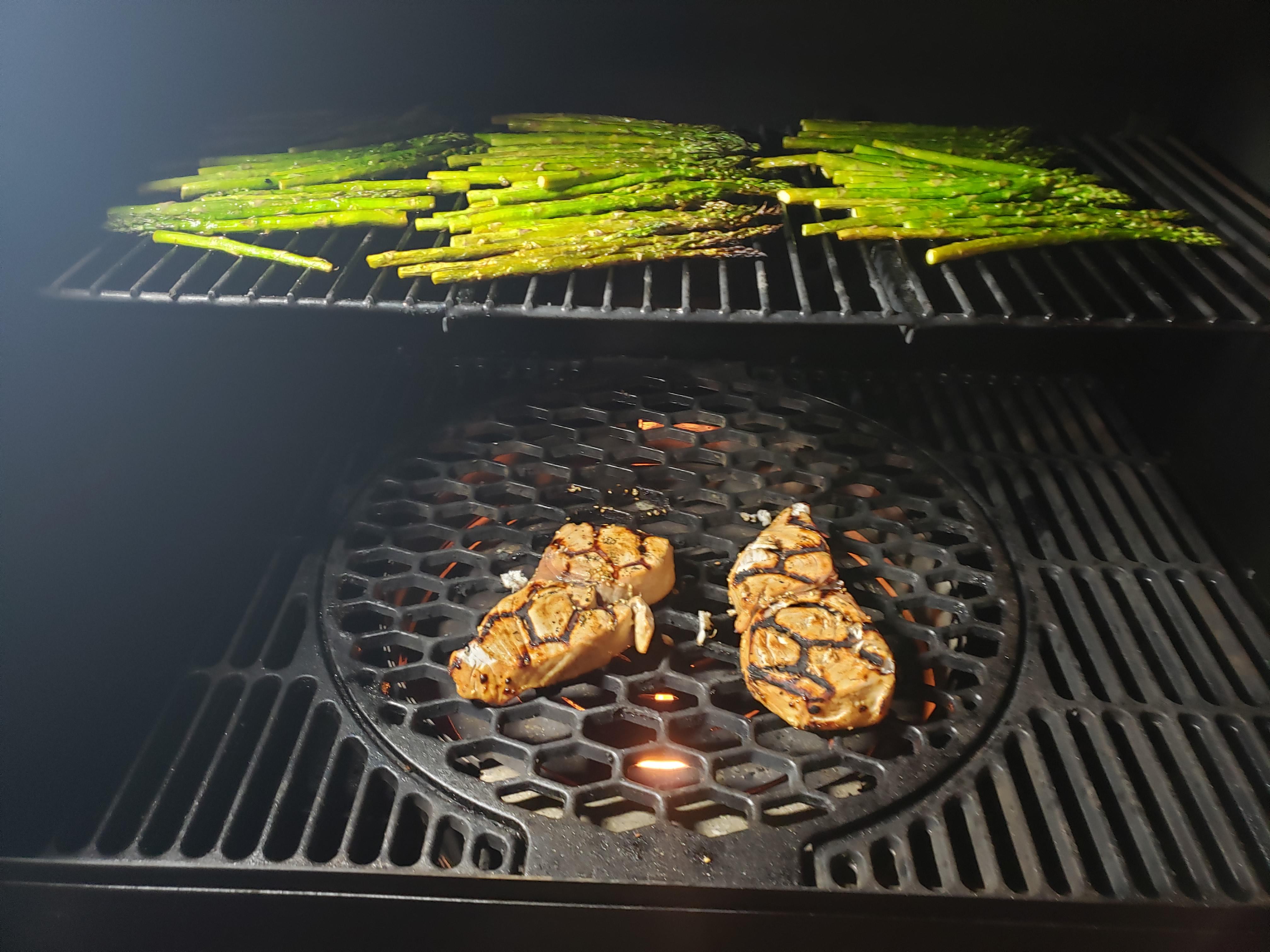 Searing fresh marlin with asparagus on an Oklahoma Joe Rider DLX pellet grill. r/pelletgrills