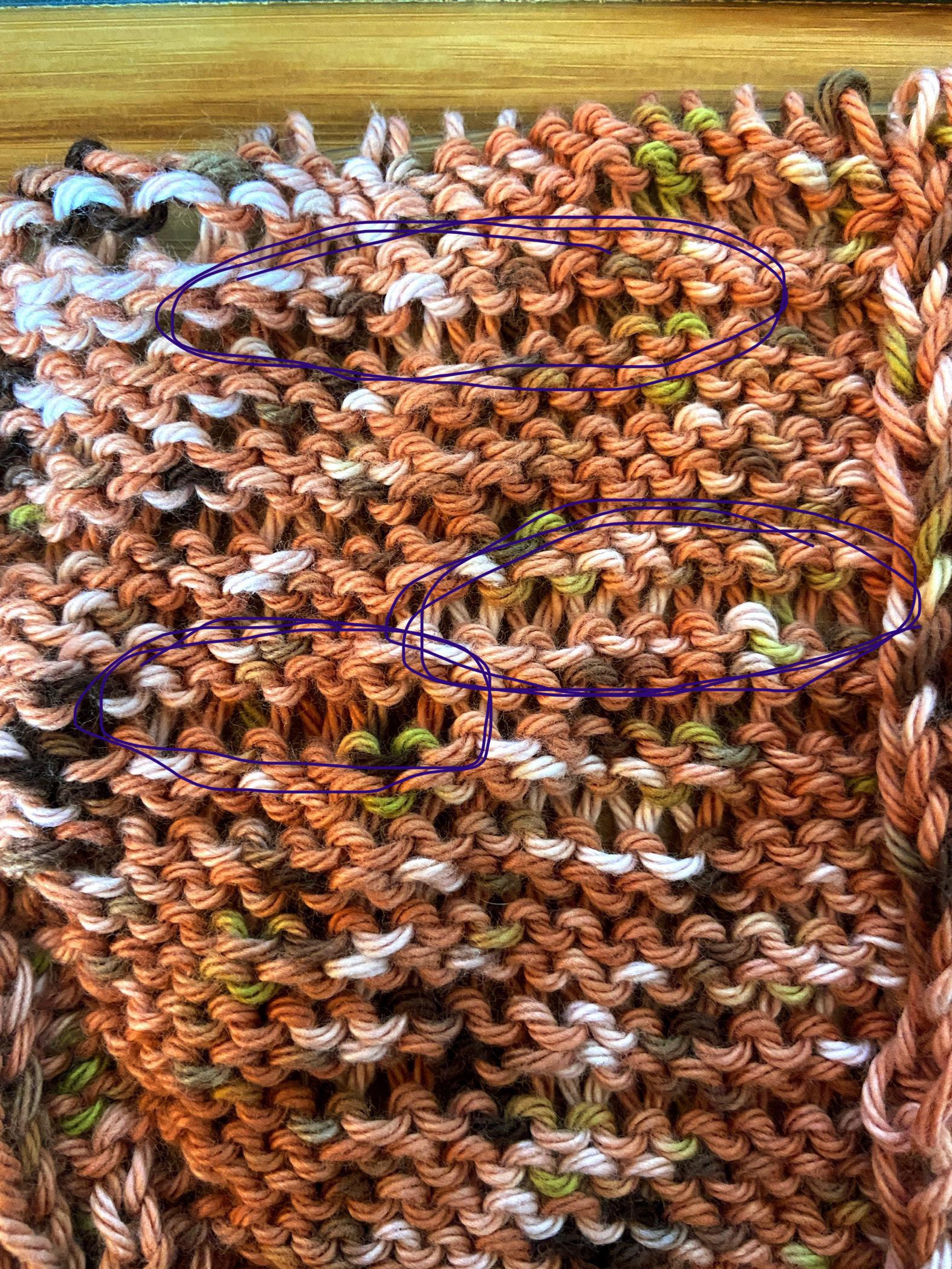 Loose stitches in the round! Any ideas what is causing this? I tried to