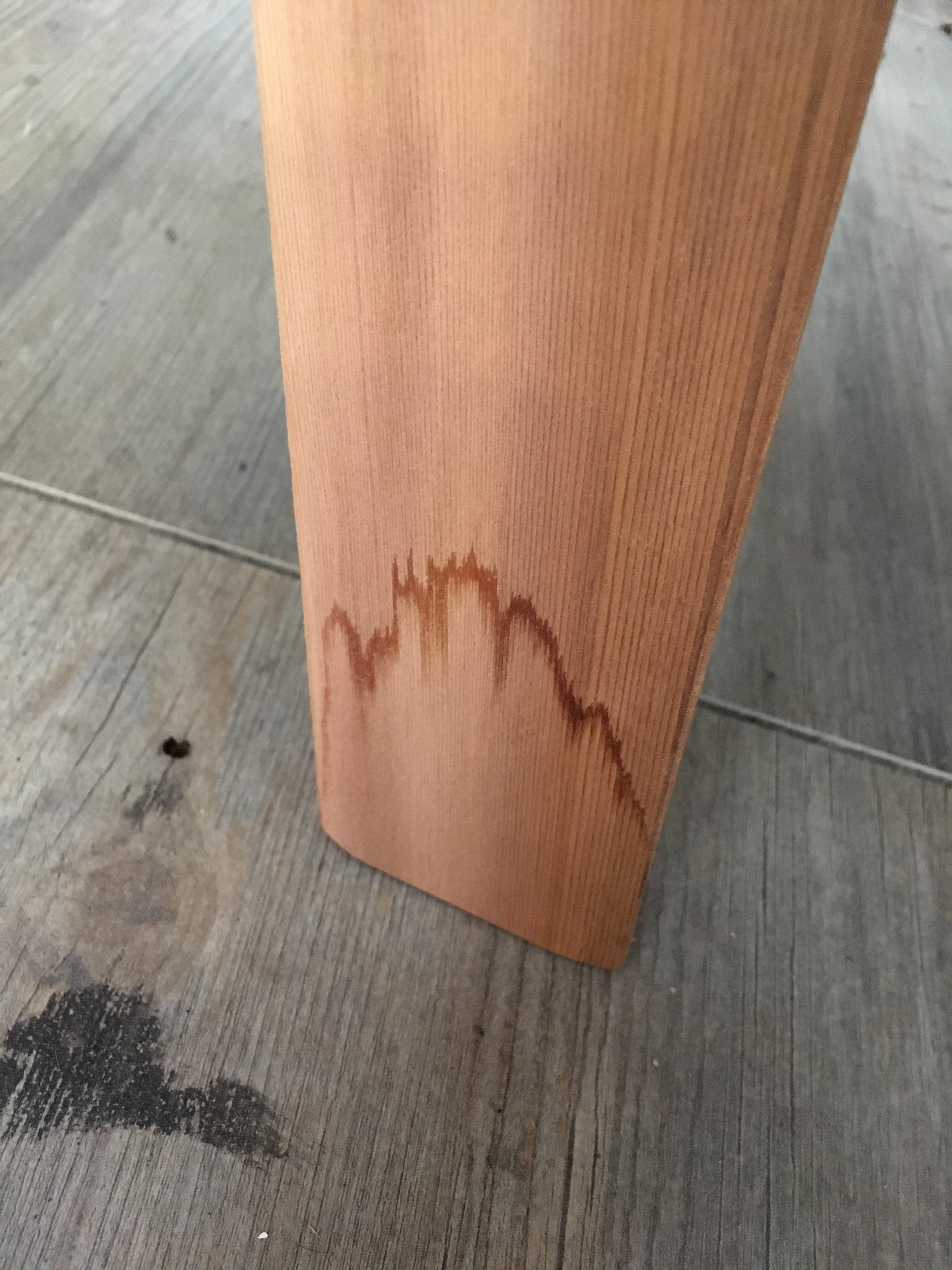 Legs of our new, unfinished cedar chairs/table got wet from below and