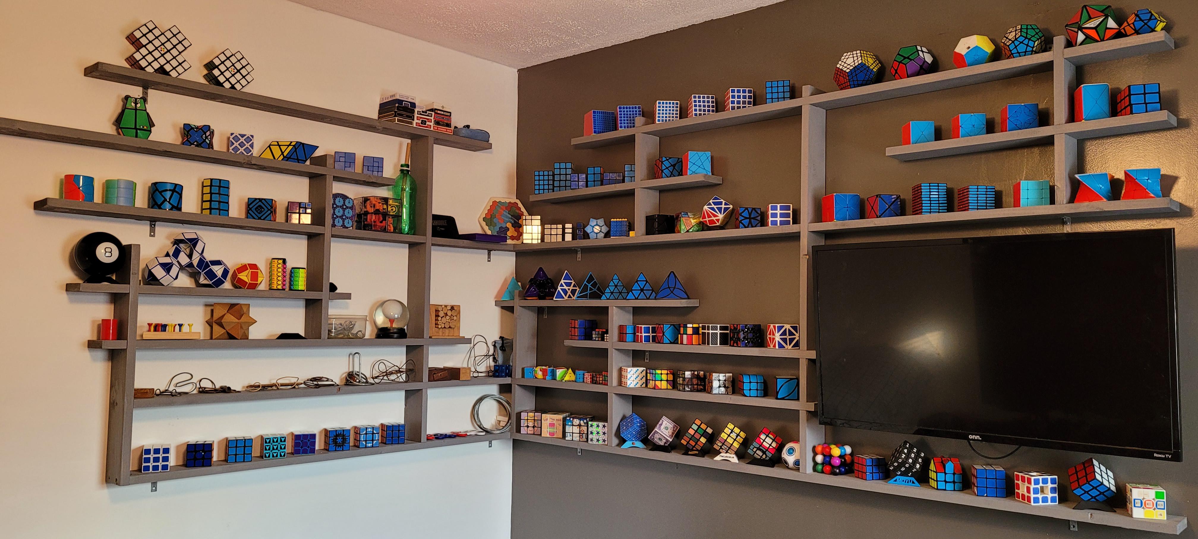 Made custom shelves for my puzzle collection. More in comments. Cubers