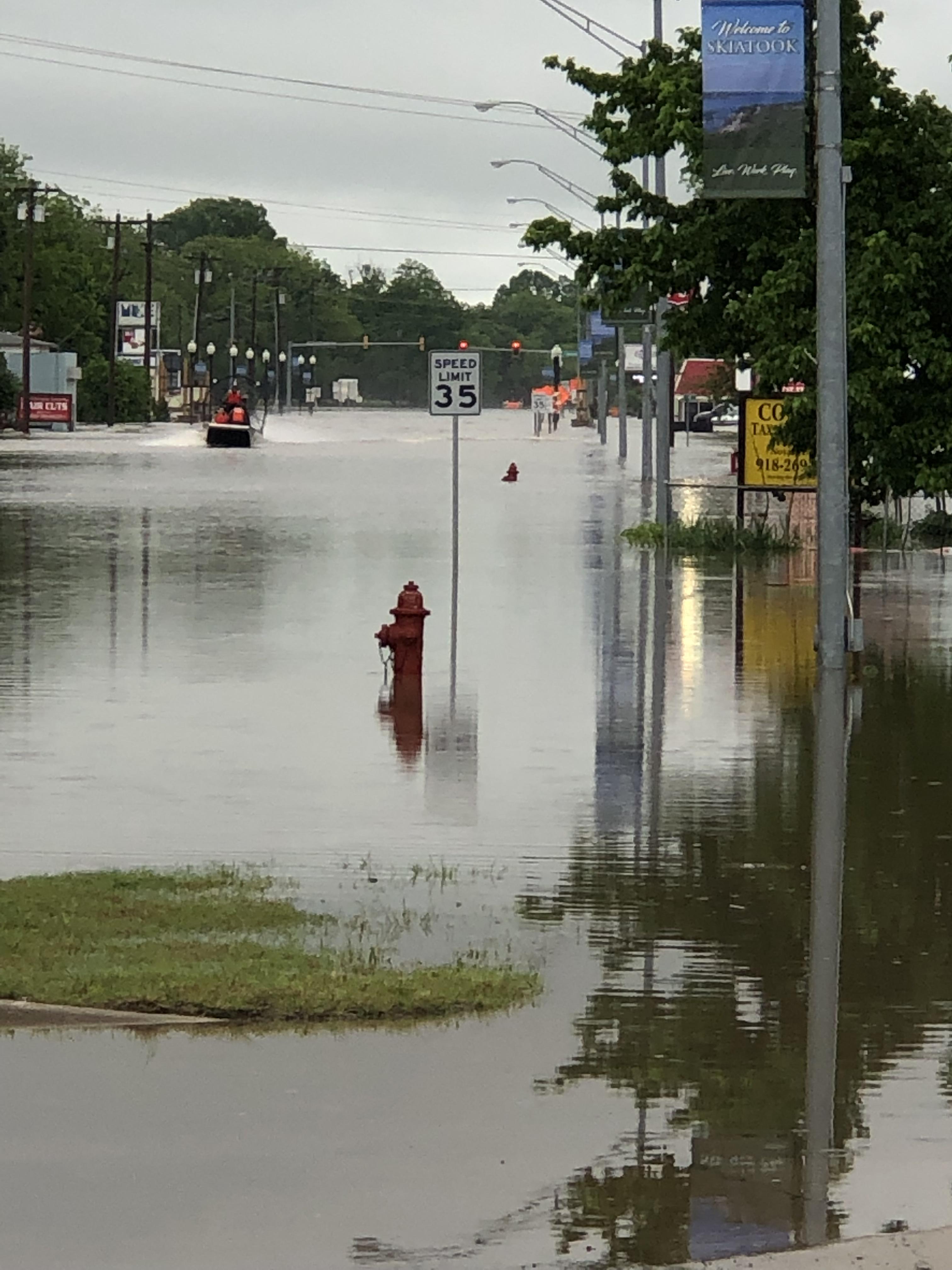 Flooding in Skiatook, Oklahoma. Airboats are being used to get people