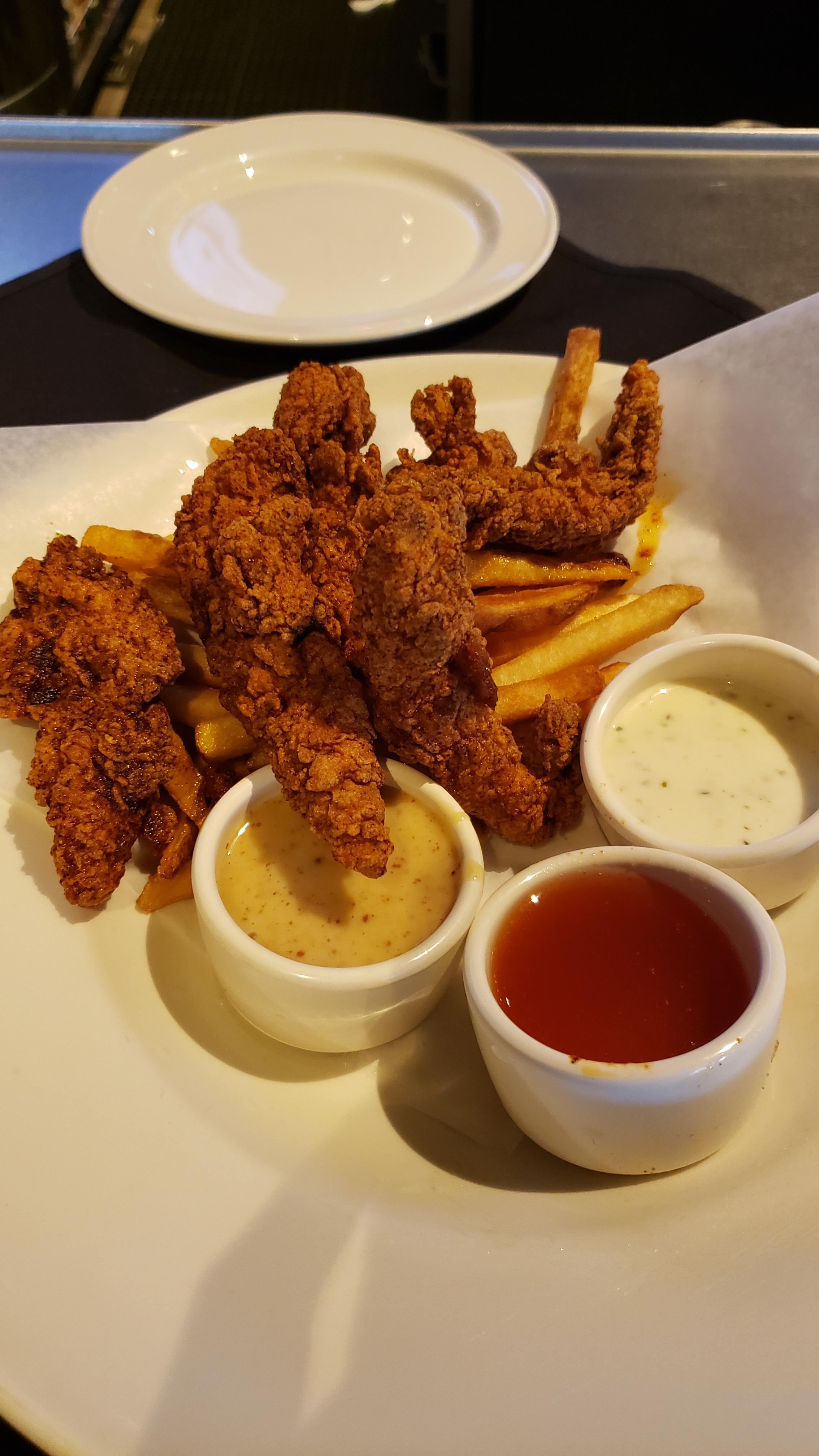 Yard House Fried Chicken Strips, tossed in Nashville Hot seasoning