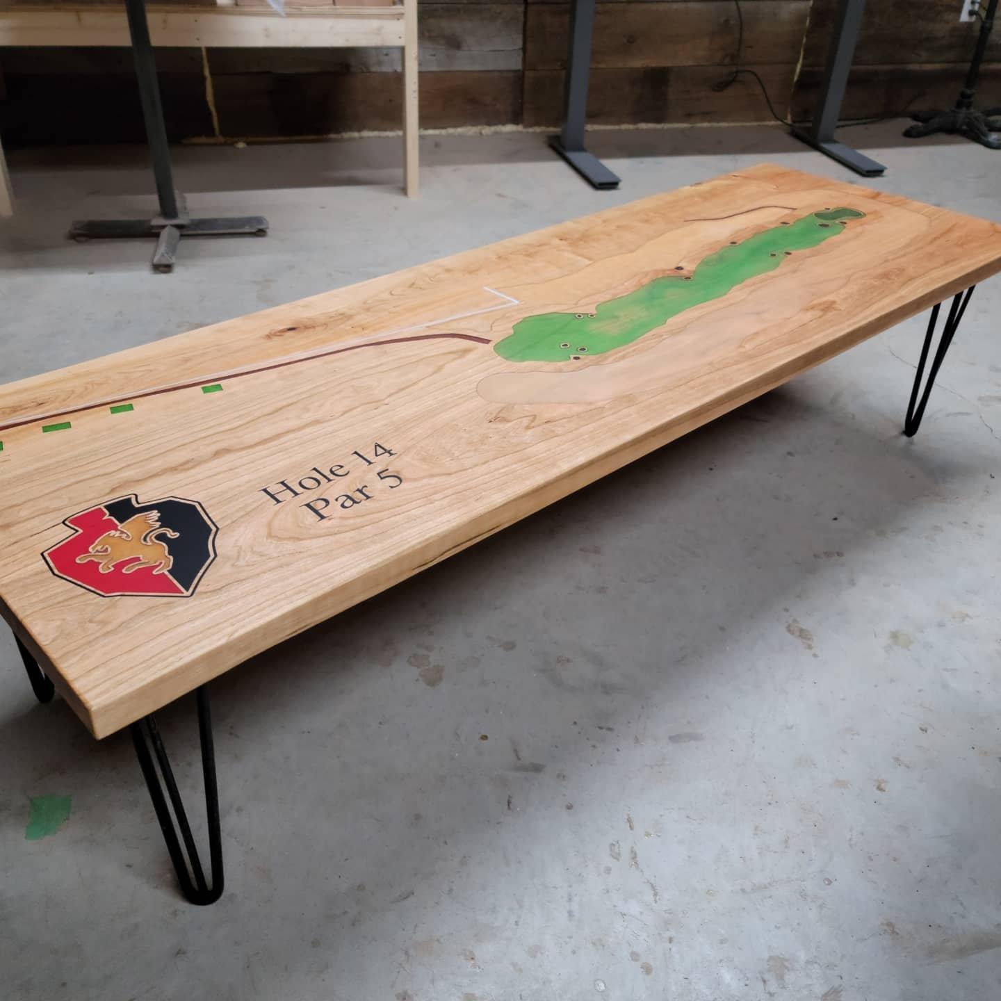 Golf table I built for my local course clubhouse. CNC Machined, Epoxy Filled. Finish your round