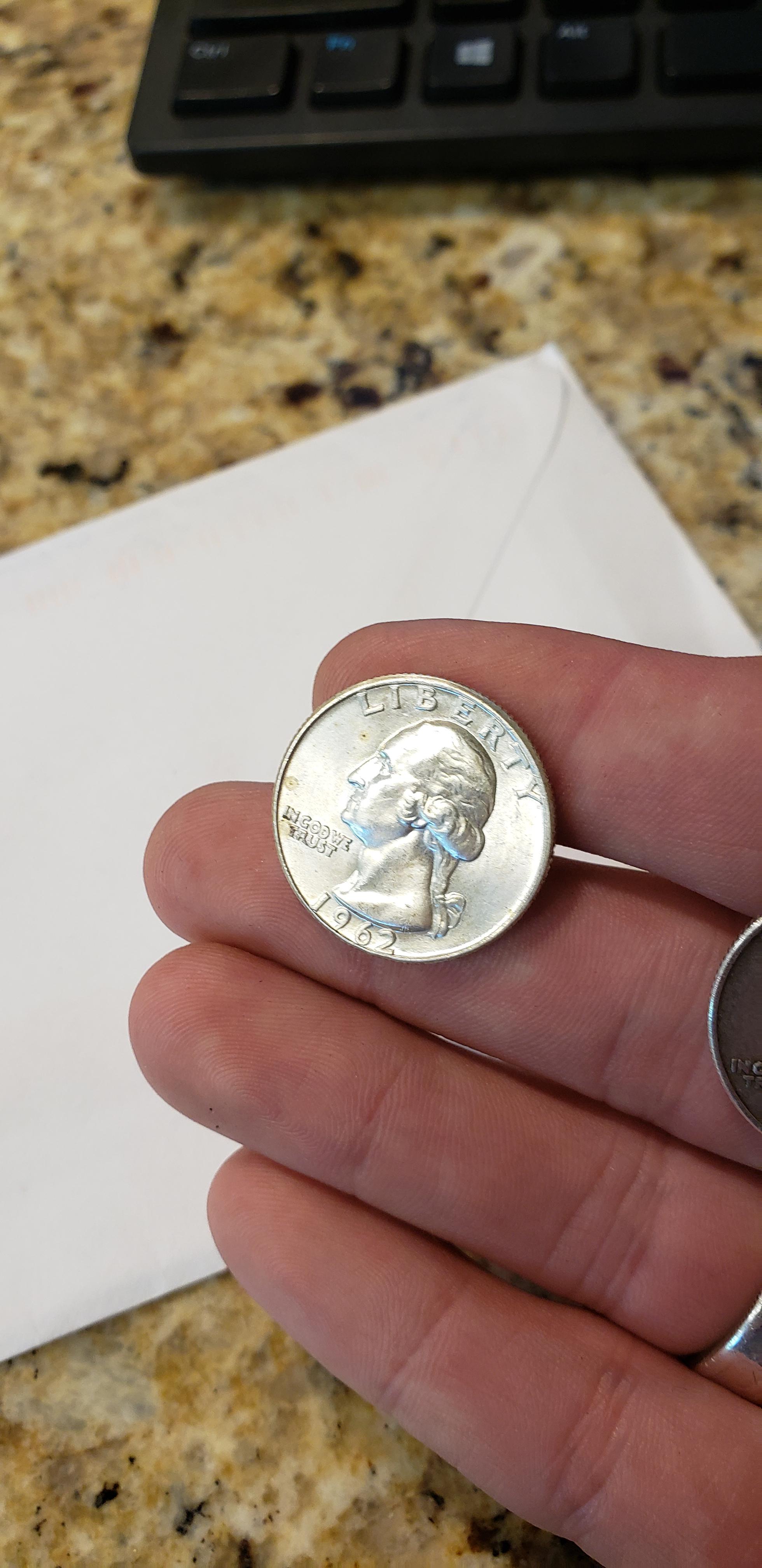Found this 1962 Silver Quarter in perfect condition! coins