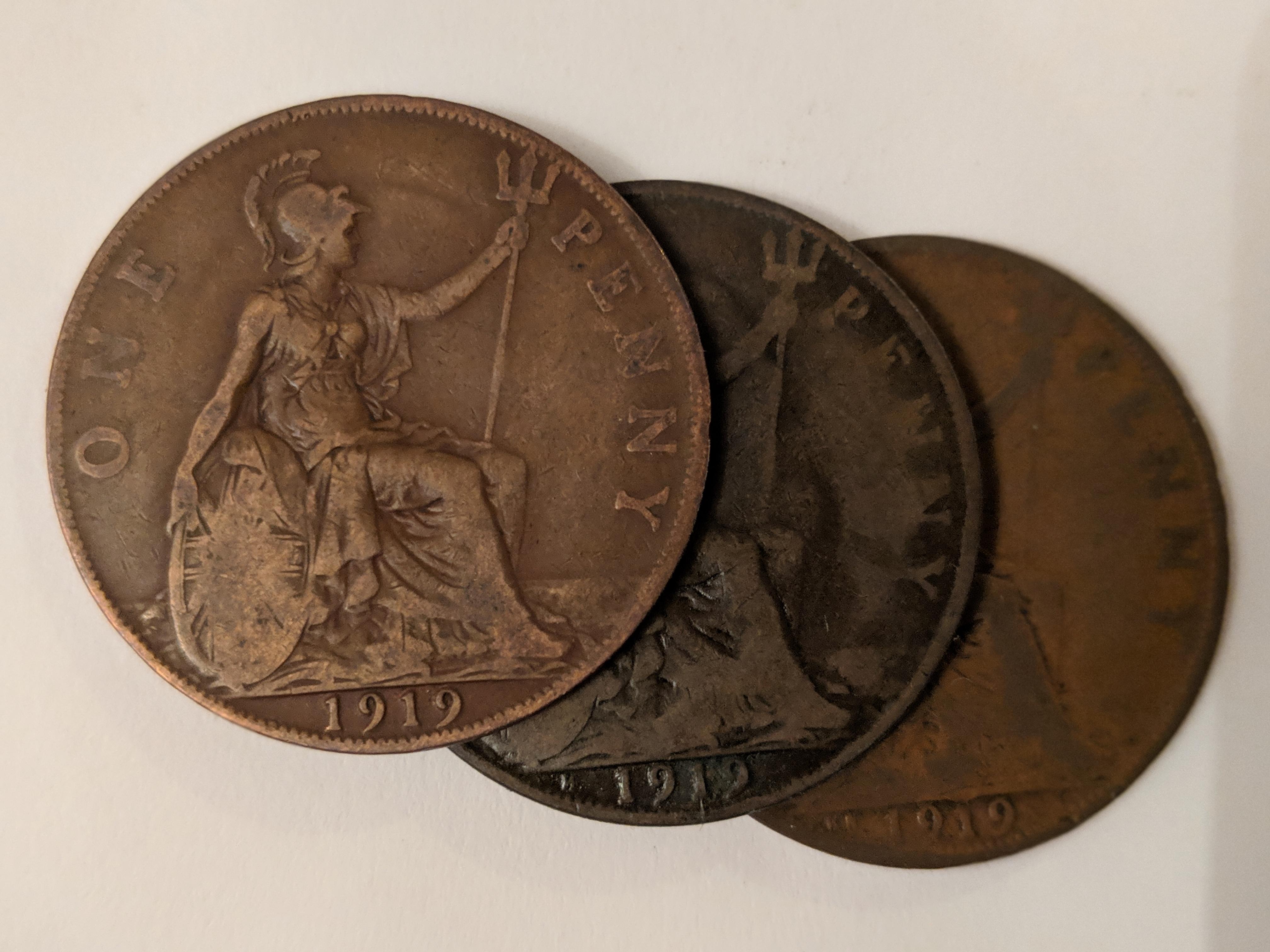 3x British Pennies 100 years old. One normal, two emergency issue