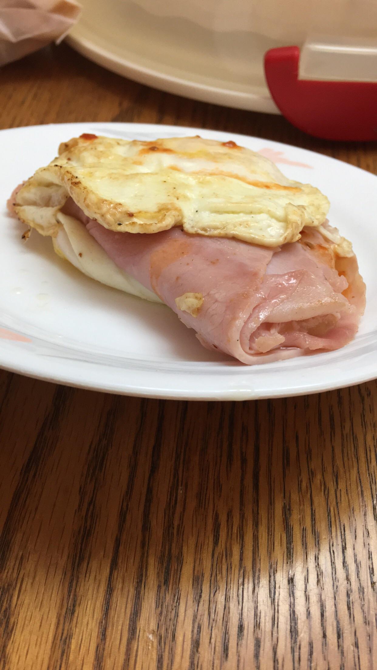 No bread breakfast sandwich one tbsp of butter in pan, two fried eggs