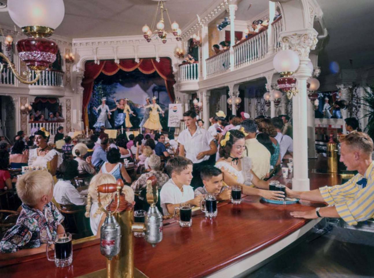 Visitors at the Golden Horseshoe Saloon on Disneyland's opening day