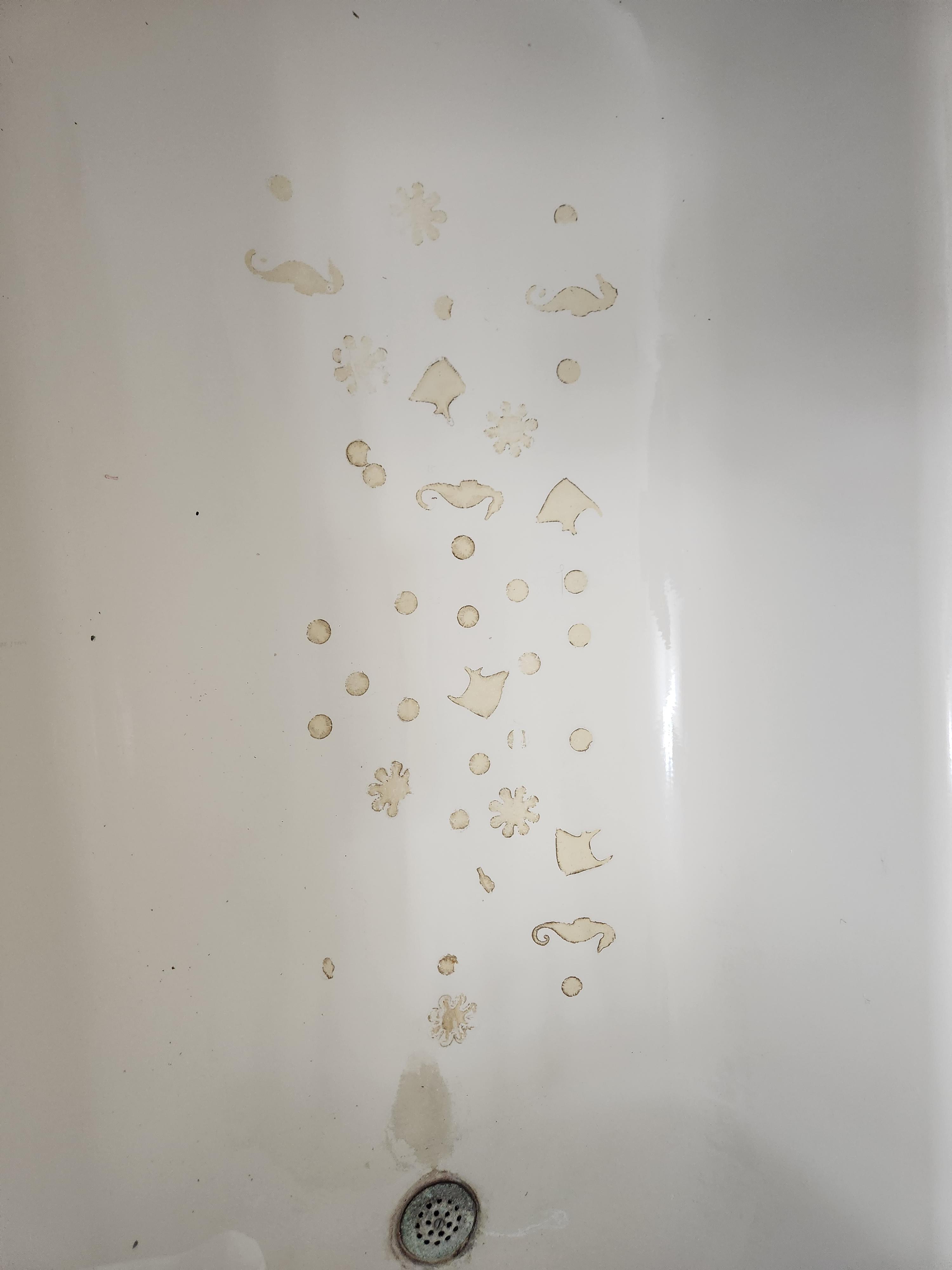 How to remove bathtub decal residue? Tried googone and nothing