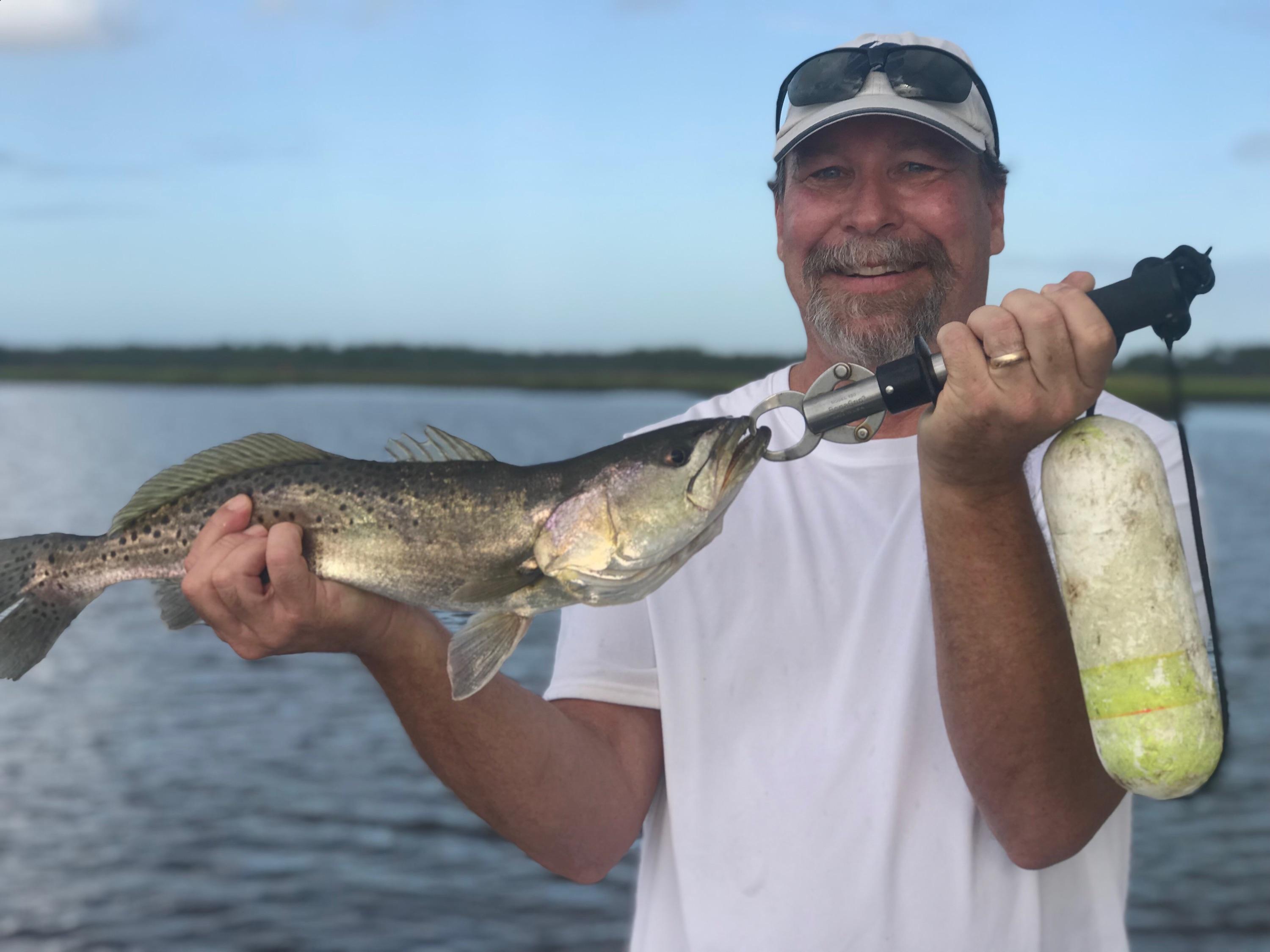 Dad found the trout bite (NE Florida) r/Fishing