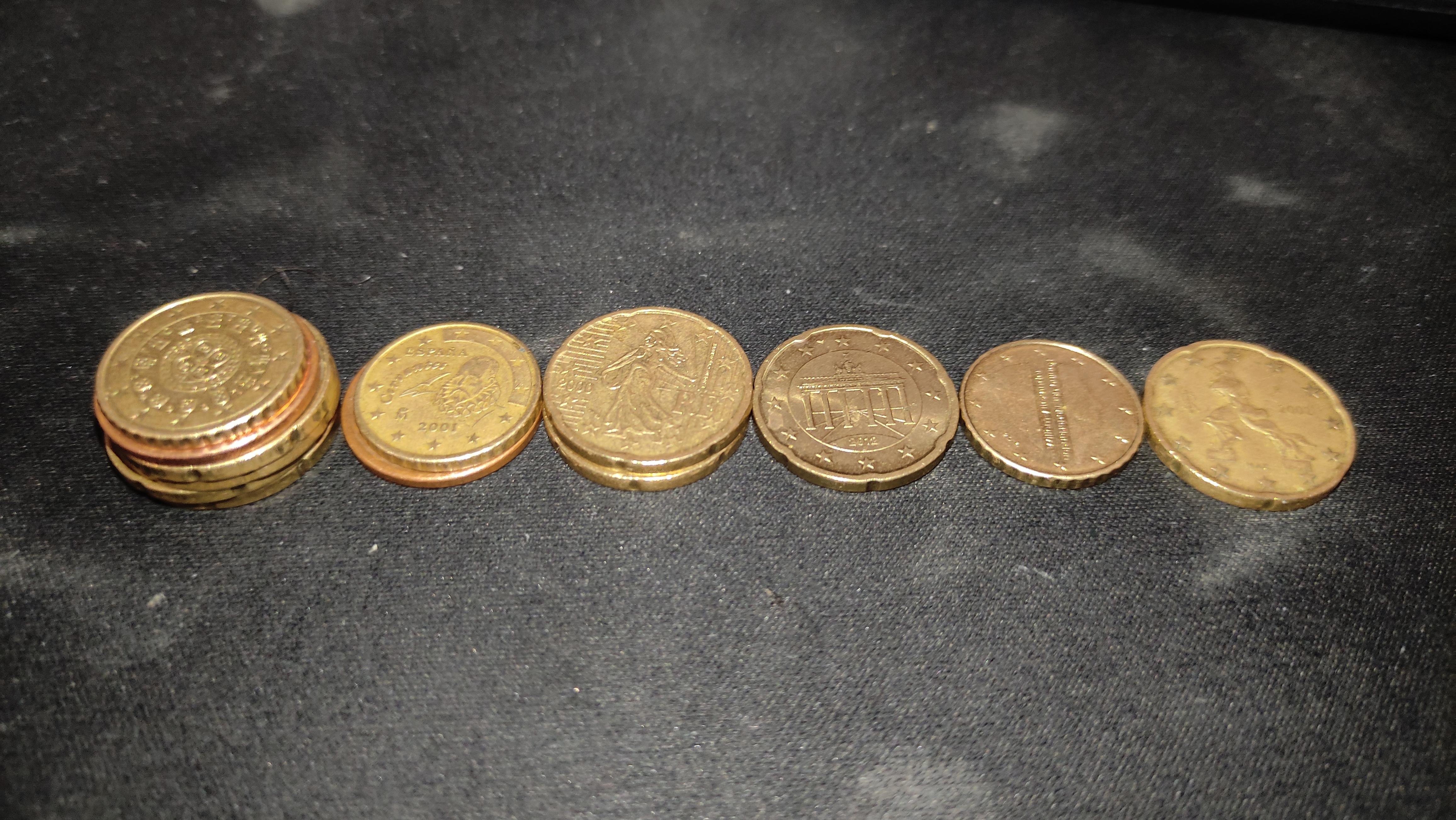 I went to my wallet and separated the coins per country, where do you