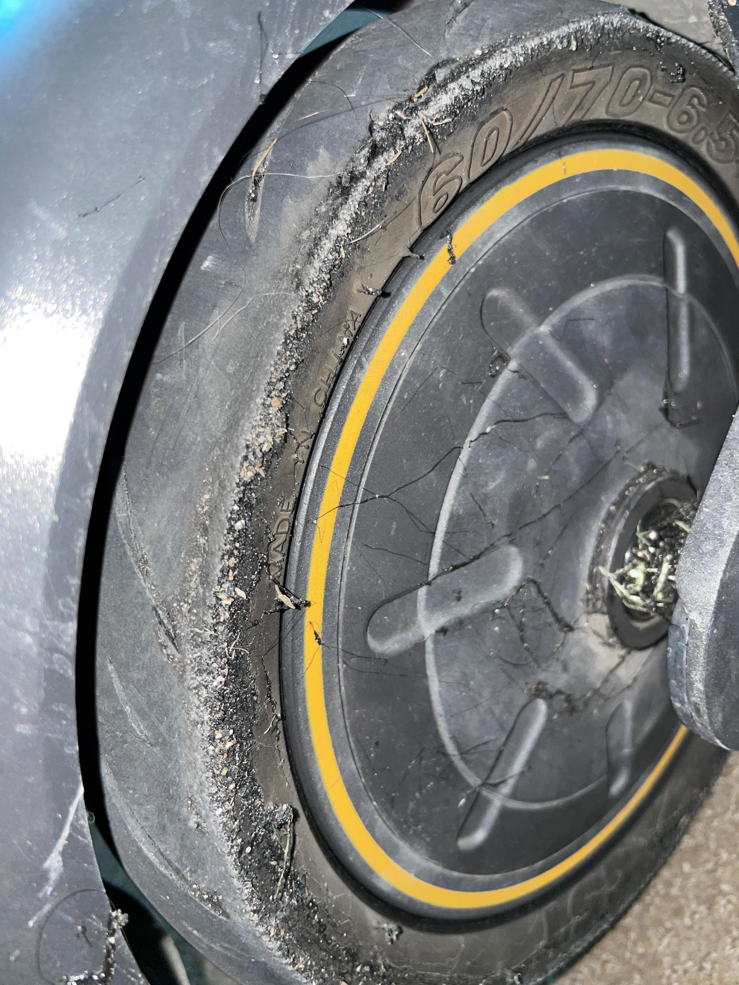 Back Tire Destroyed. Won’t hold air and looks like it’s melting on the