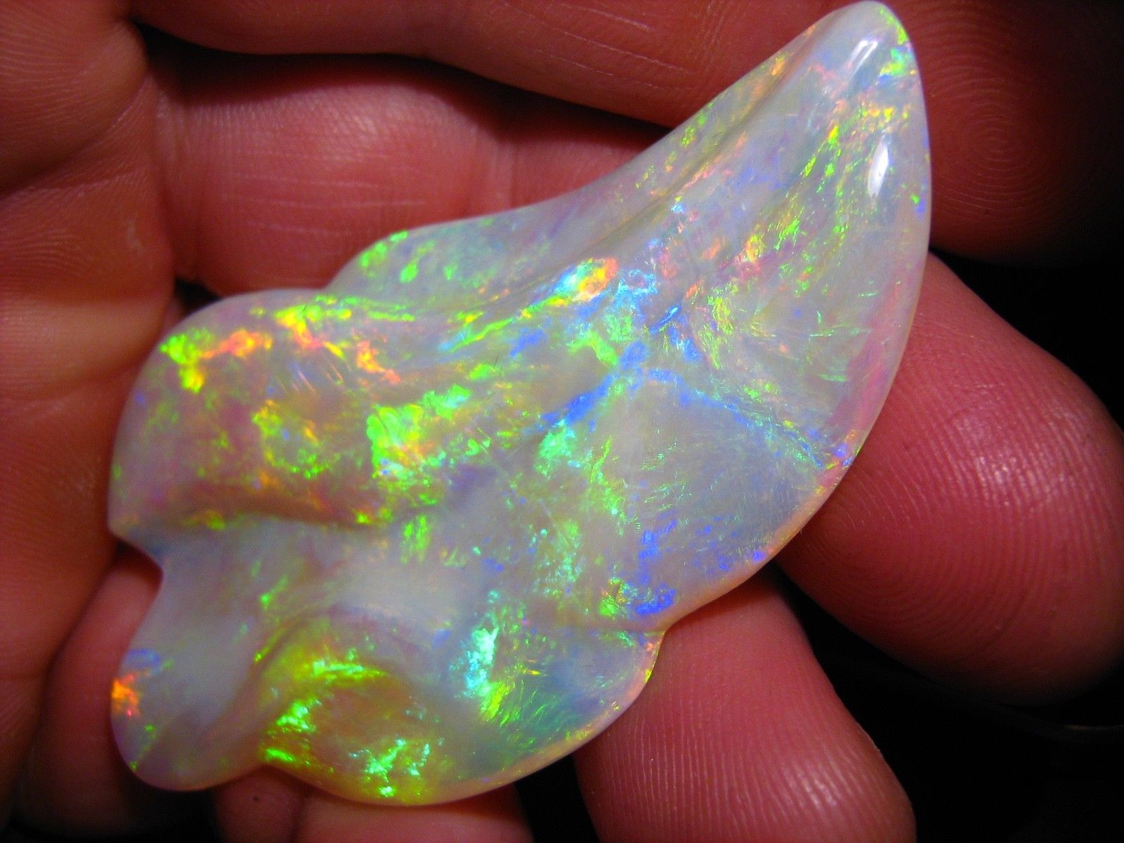 This opal has a unique shape r/MineralPorn