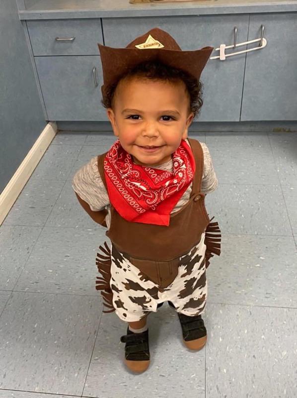 Our 16 month old son showing off his outfit for “cowboy day” at daycare