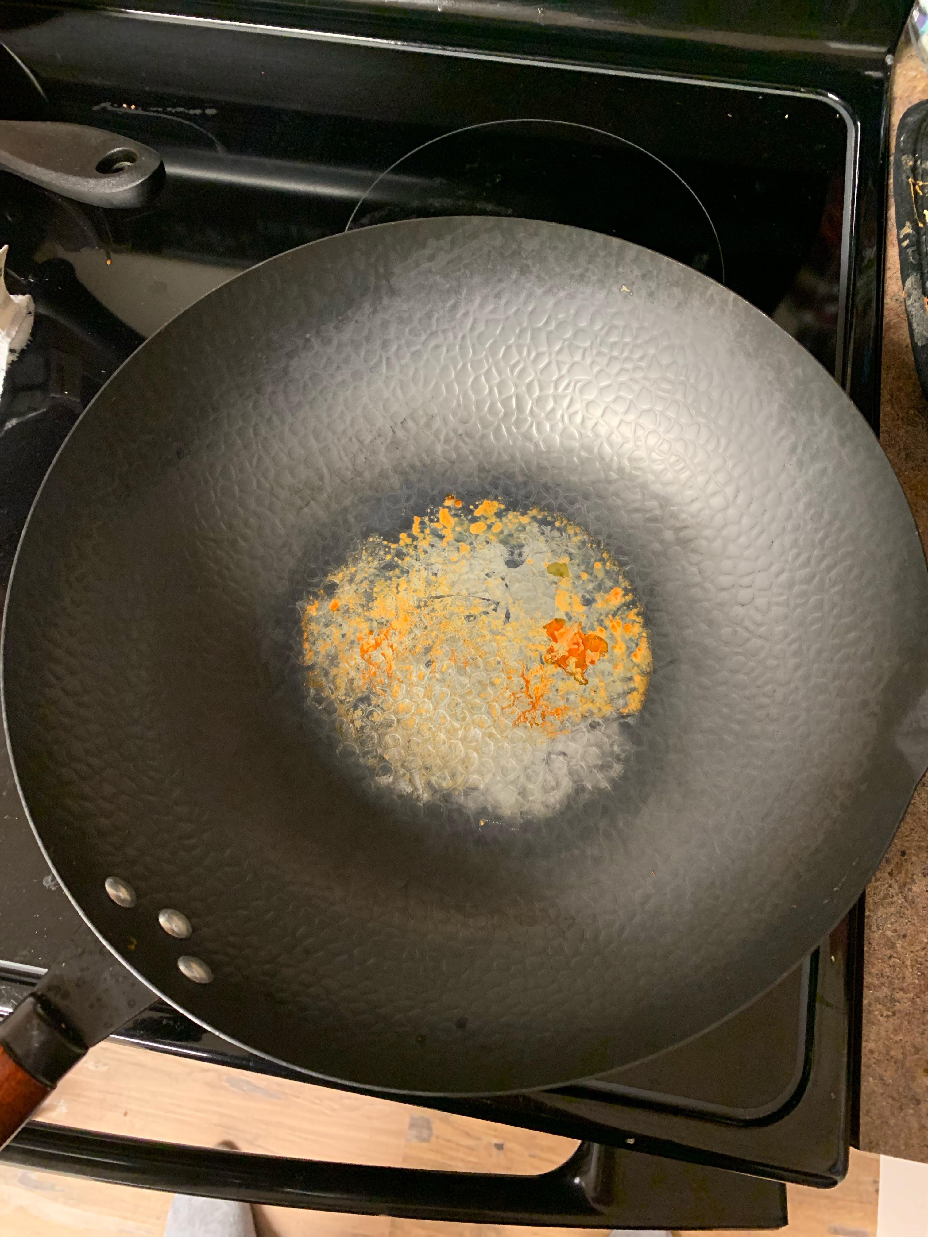 Help! i used my new wok once without adding oil layers before hand and