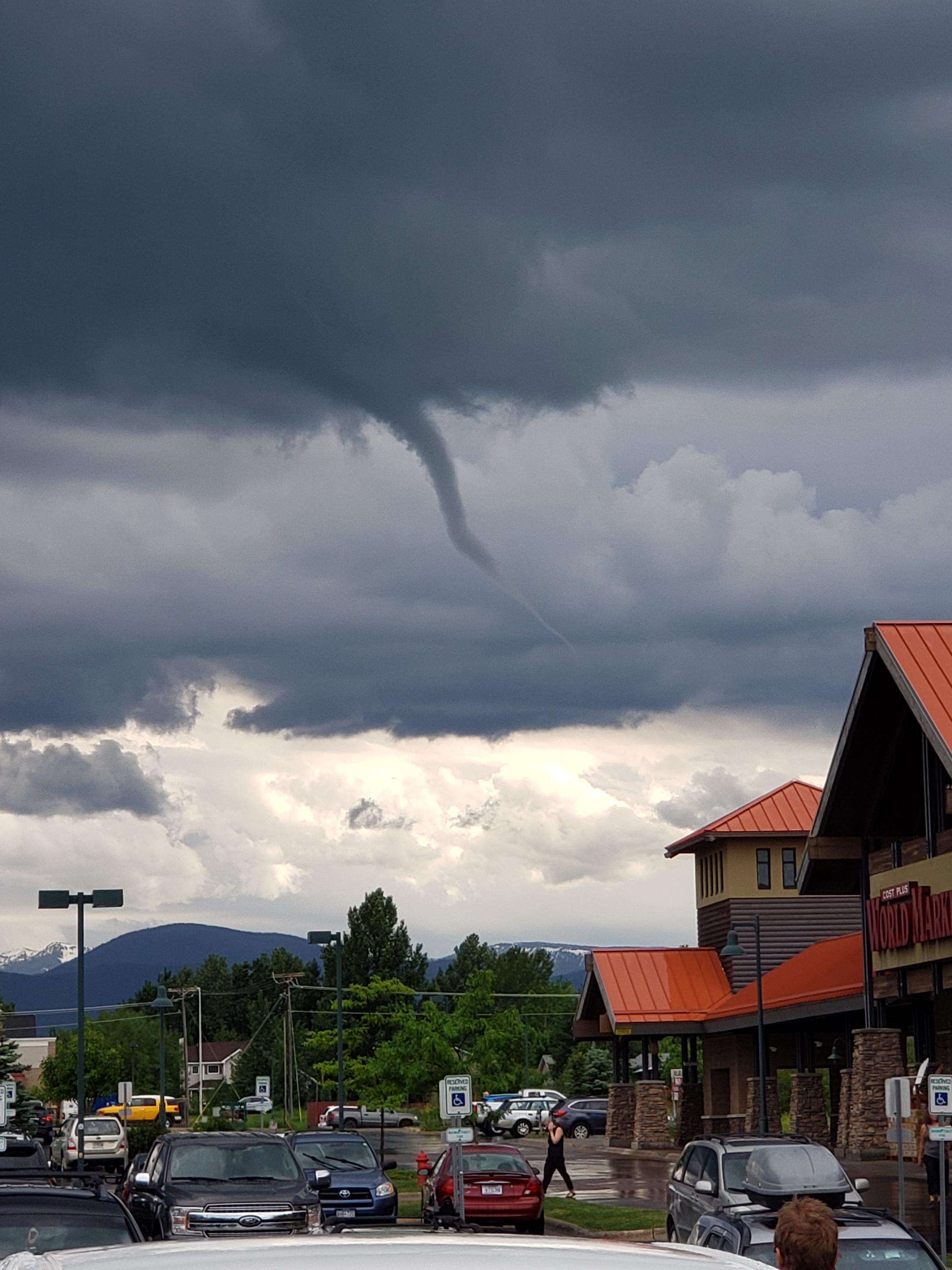 Funnel cloud in Bozeman today. Had the whole parking lot looking. r
