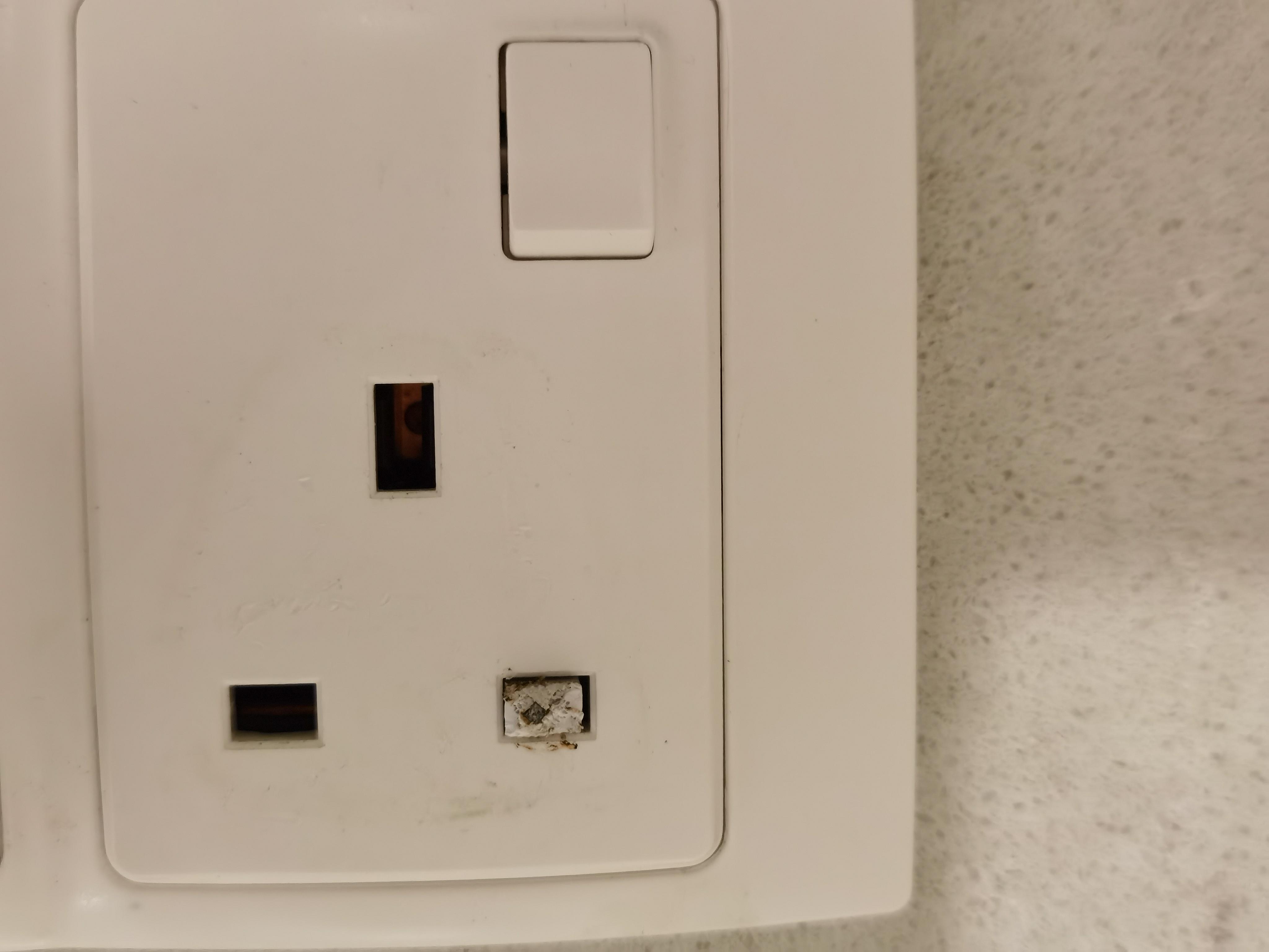 How to extract a stuck pin in a wall socket? r/fixit