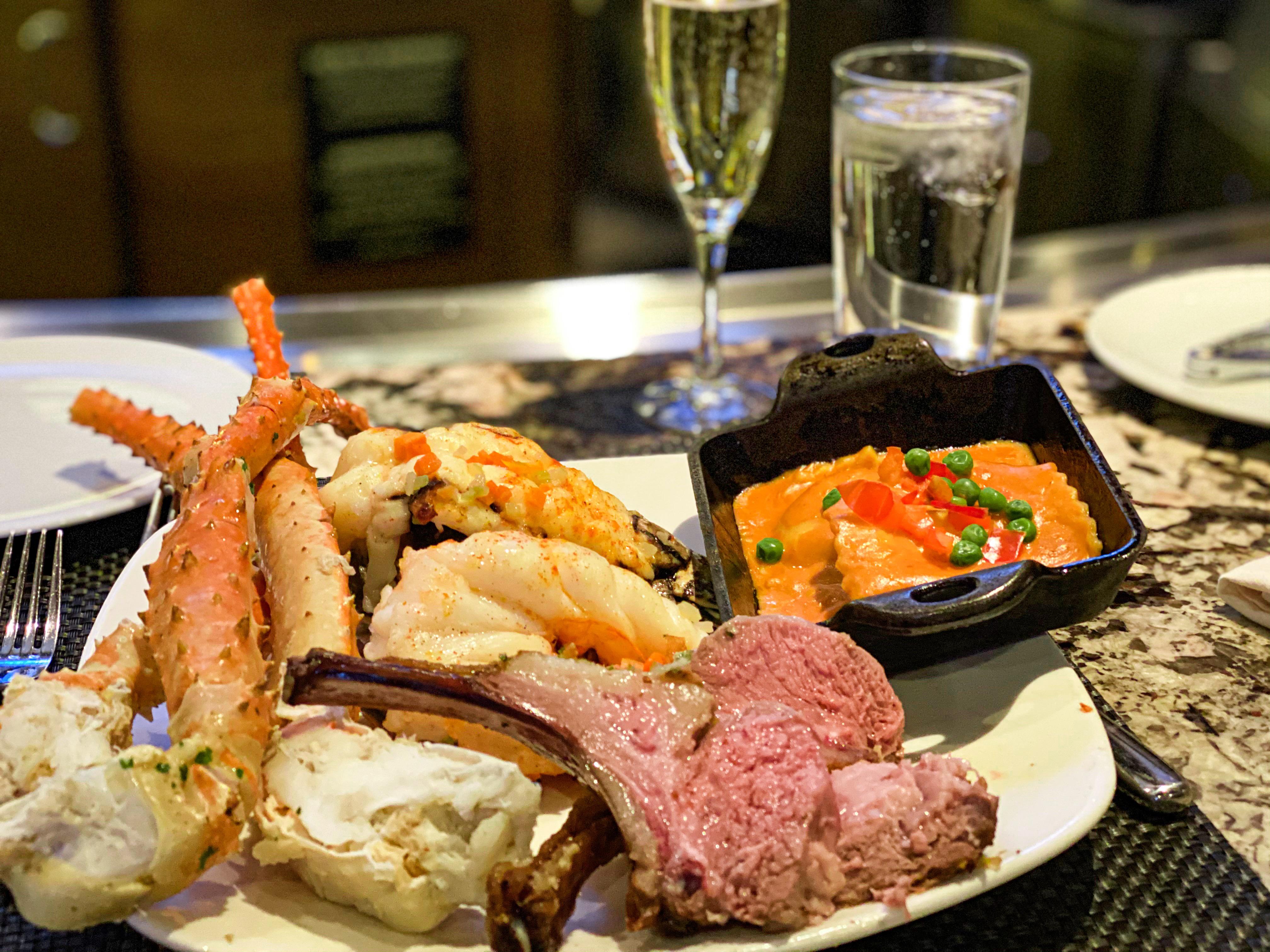 [I ate] King crab legs, lobster tails, lamb chops, and lobster ravioli