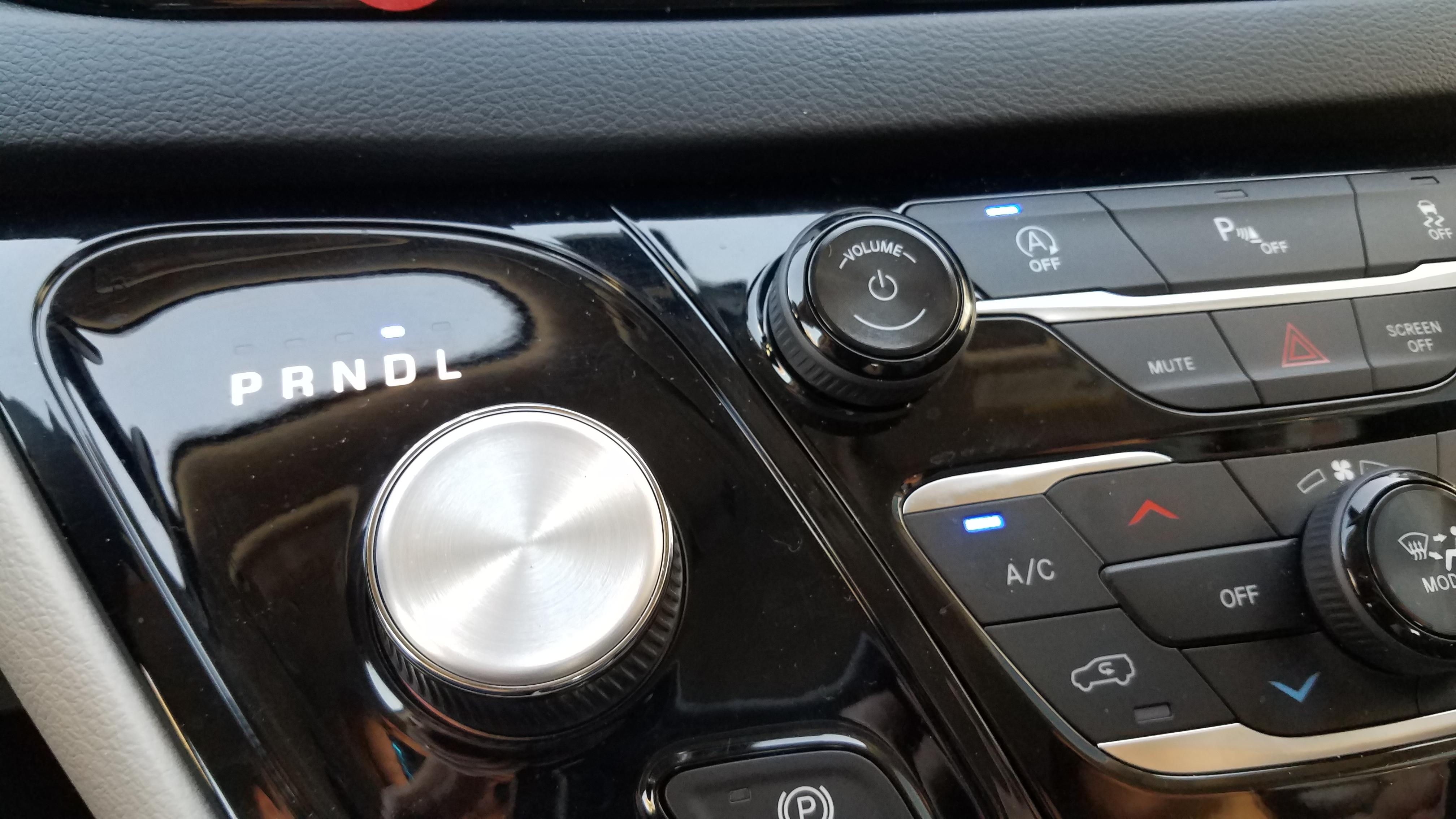 Rental car had a dial for the gearshift a few cm from the audio volume
