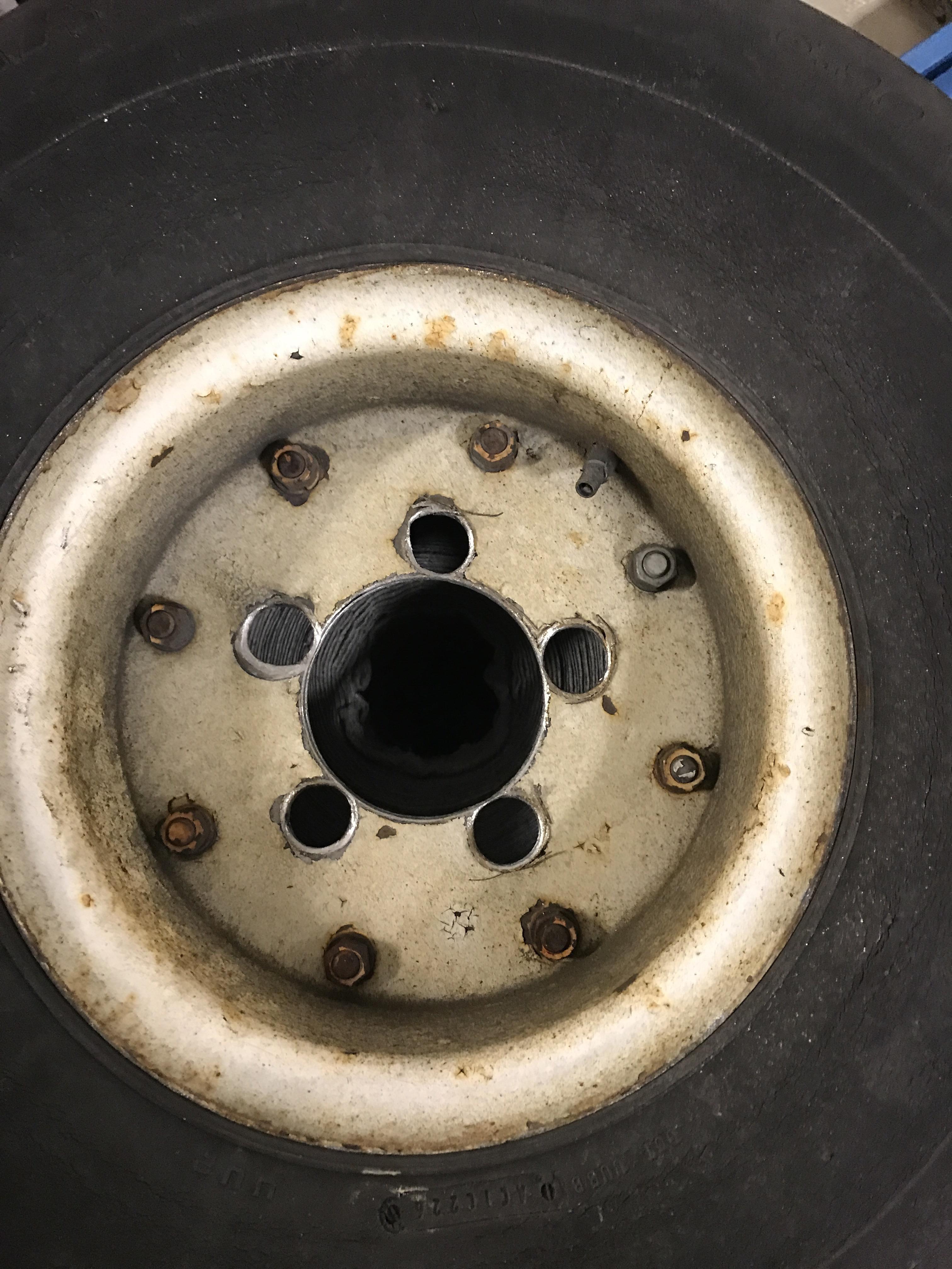 This wheel came off of a luggage cart at work and the lugs were still