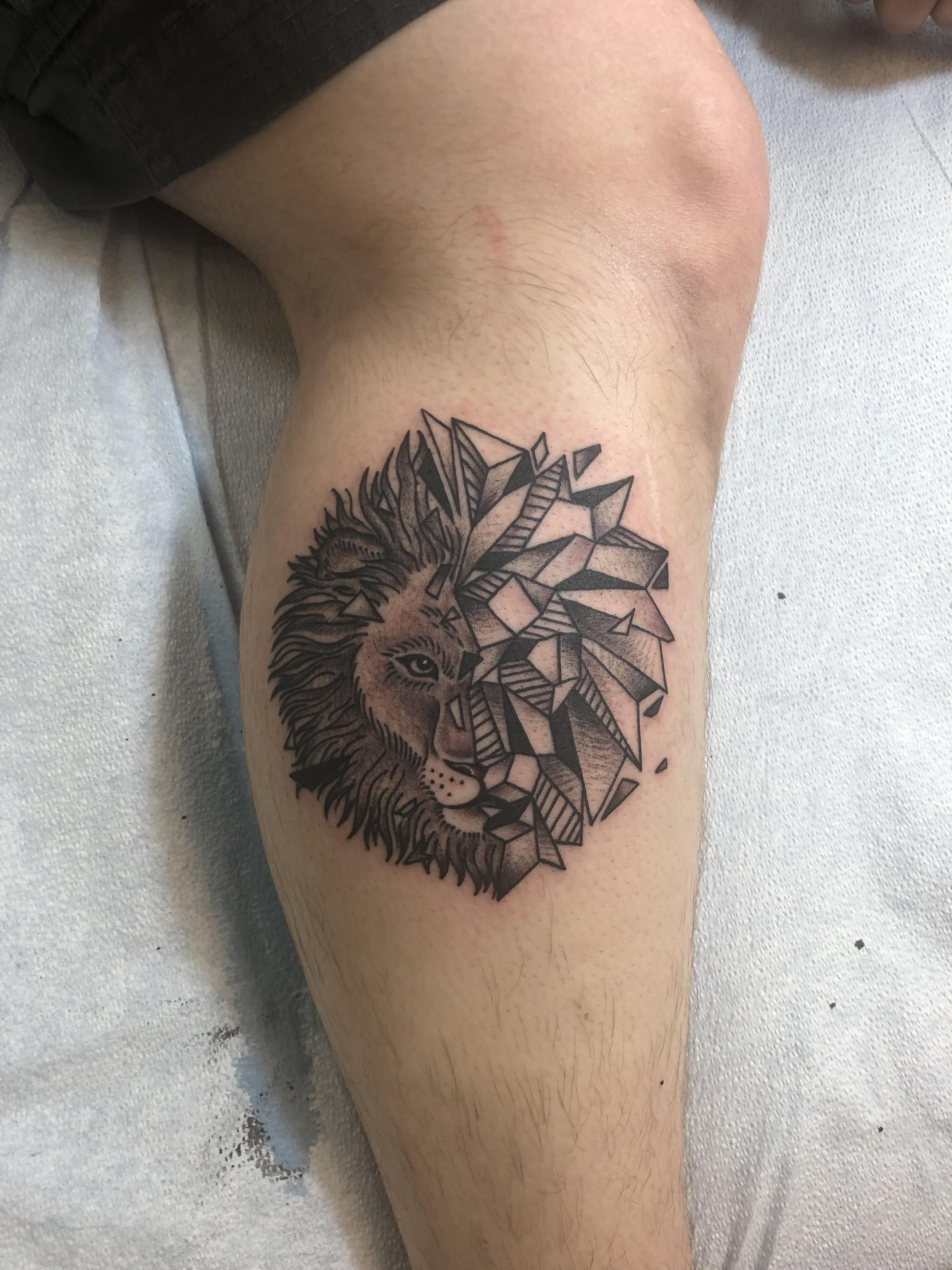 My geometricsplit lion done by Danielle Vetter Solid Gold Tattoos in