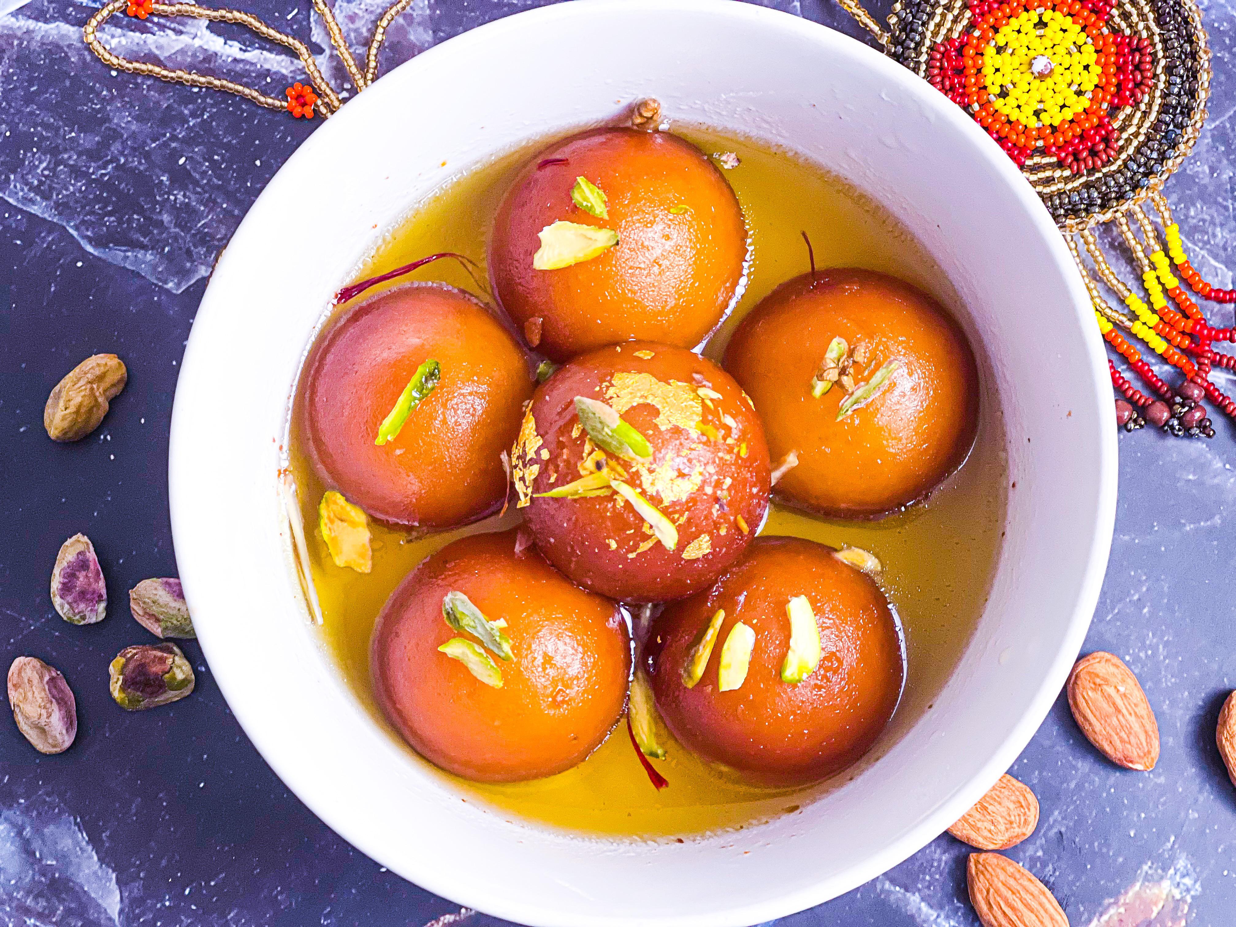 Gulab Jamun, famous Indian dessert shot with iPhone 13, light placed on